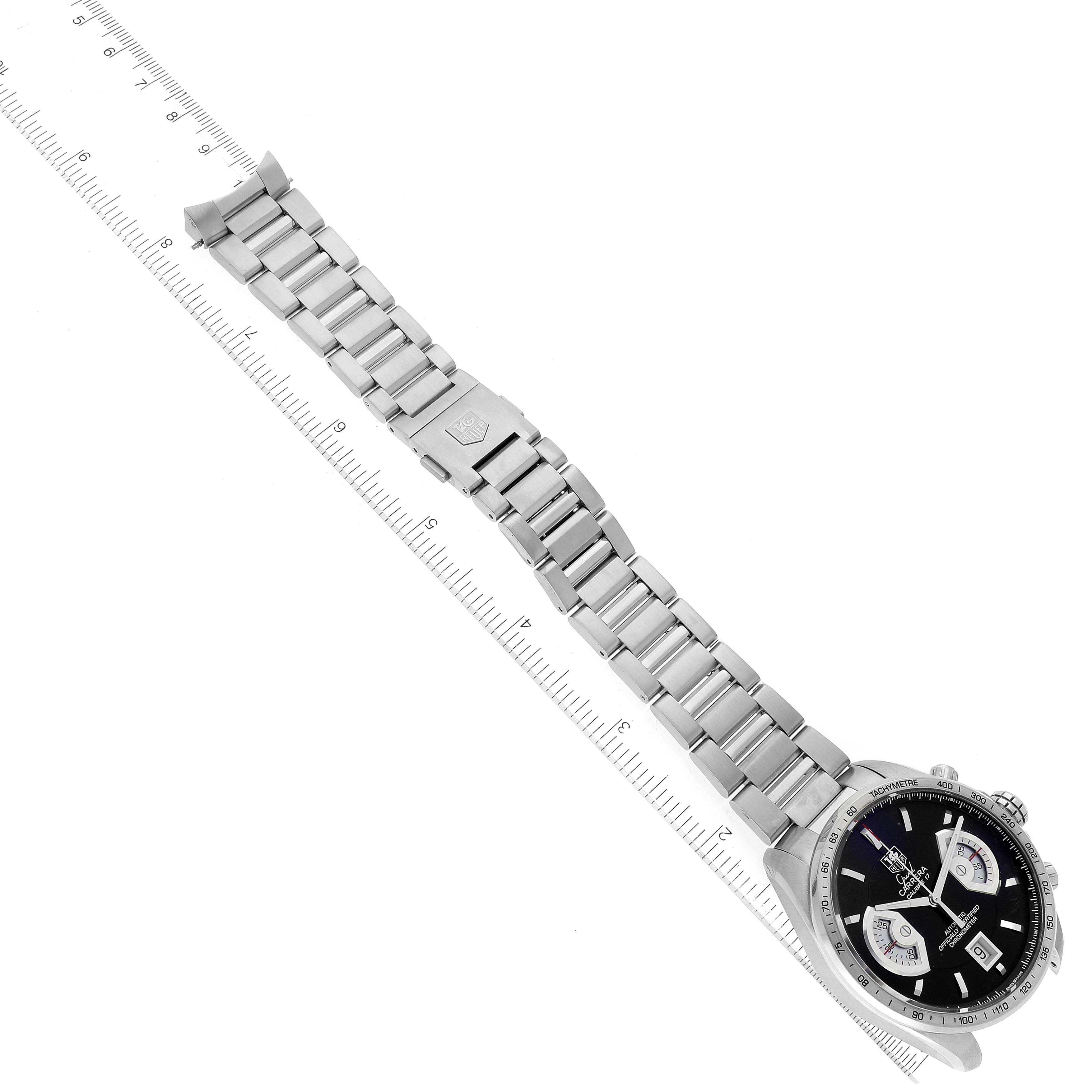 This image shows the Tag Heuer Carrera CAV511A.FC6225 Men's Stainless Steel Black Dial CAV511A.FC6225 Men's Stainless Steel Black Dial watch at an oblique angle, focusing on its bracelet and partially on its dial.