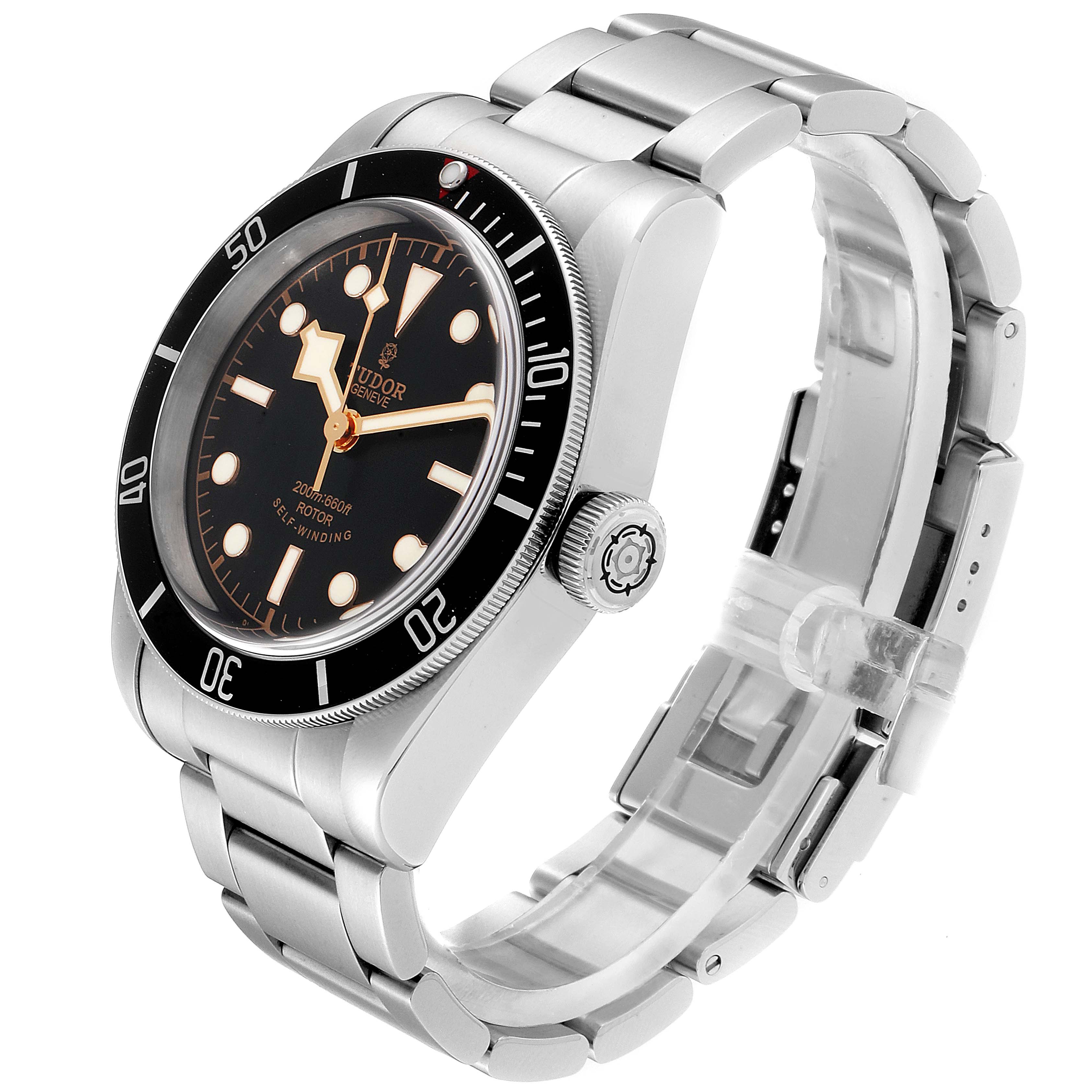 The Tudor Heritage Black Bay 79220R Men
s Stainless Steel Black Dial 79220R Men
s Stainless Steel Black Dial watch is shown from a 3/4 angle, highlighting the dial, bezel, crown, and bracelet.