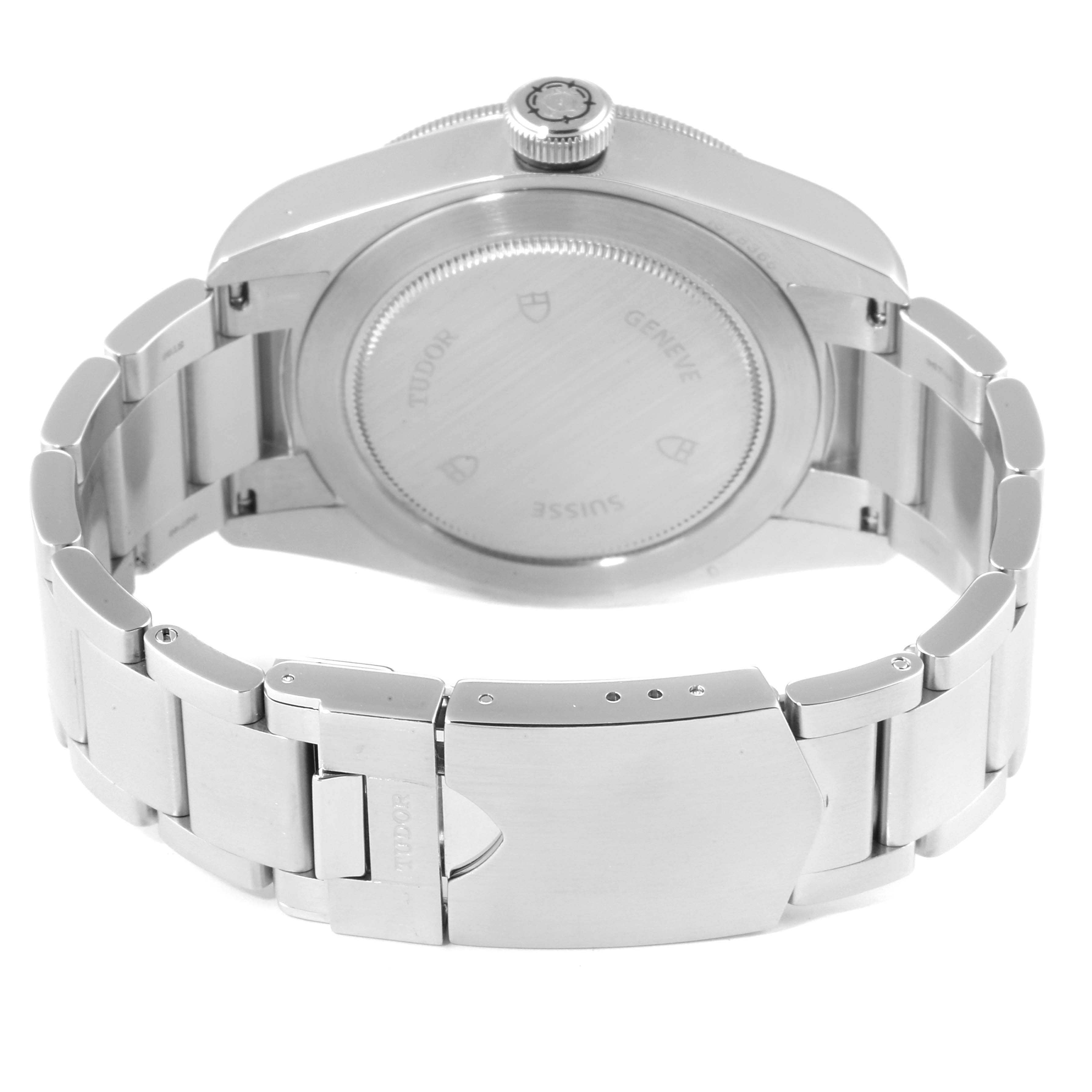 The image shows the backside and bracelet of the Tudor Heritage Black Bay 79220R Men
s Stainless Steel Black Dial 79220R Men
s Stainless Steel Black Dial watch, including the case back and clasp.