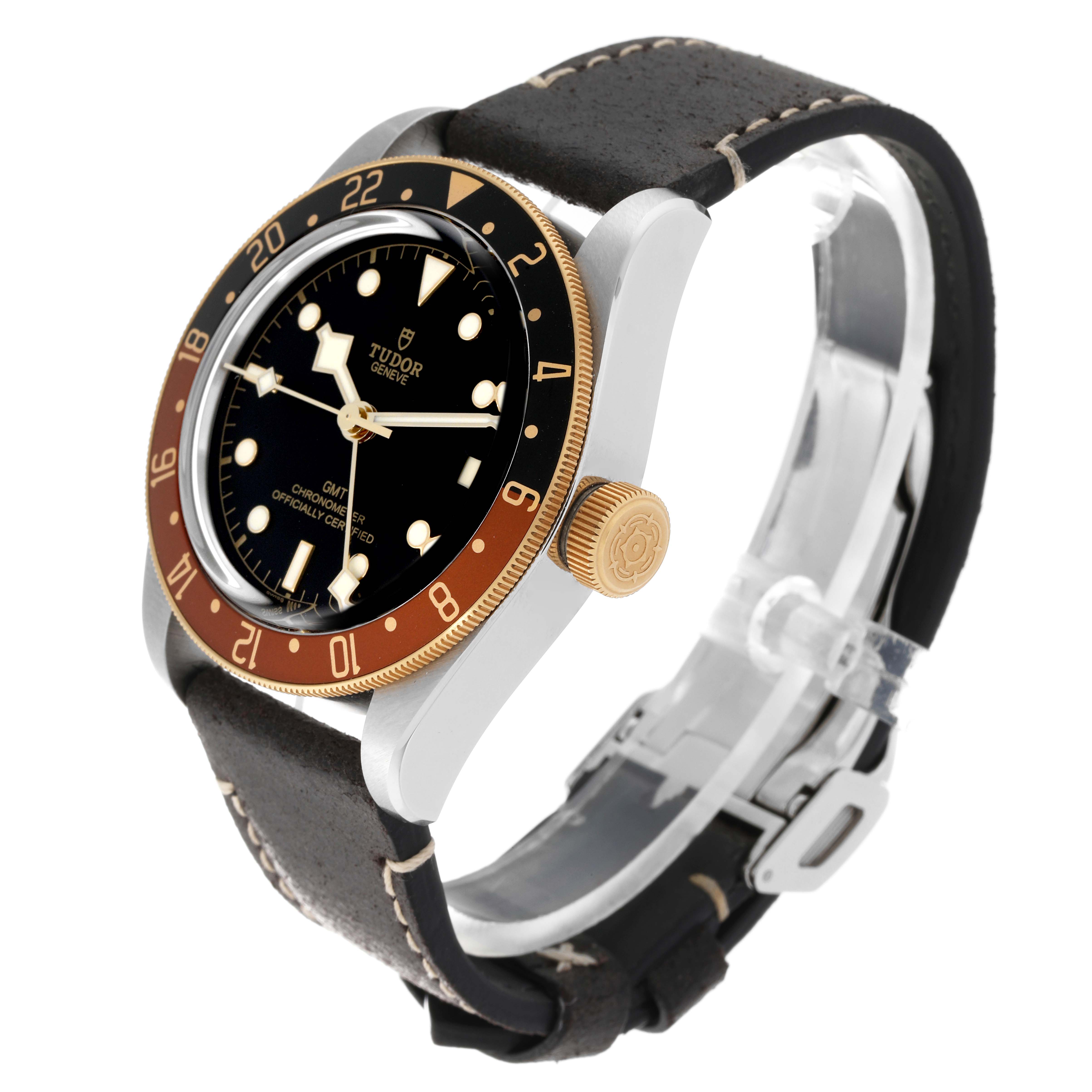 The Heritage Black Bay GMT watch by Tudor is shown at a three-quarter angle, highlighting the dial, bezel, crown, and strap.