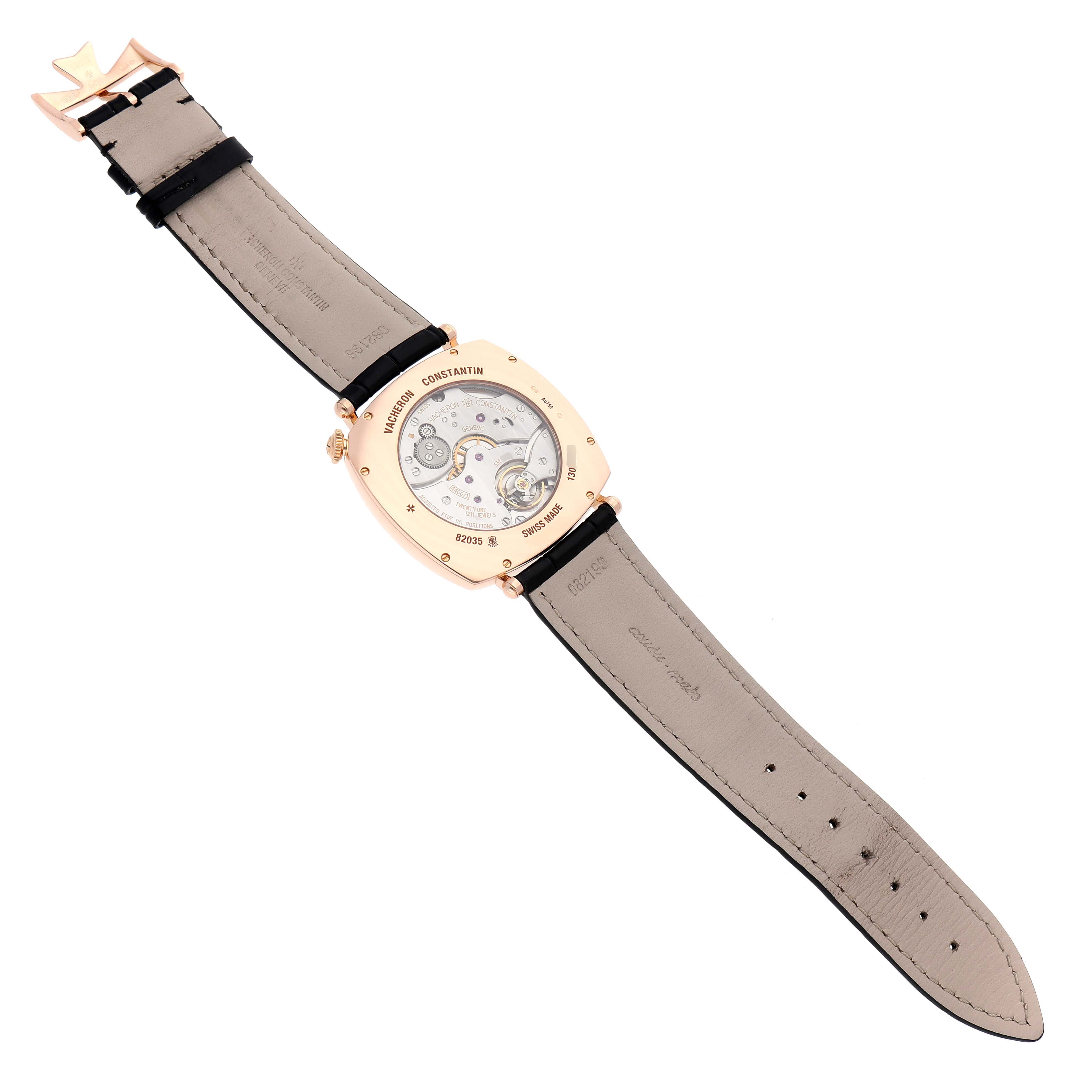 The Vacheron Constantin Historiques 82035/000R-9359 Men's Rose Gold Silver Dial watch is shown from the back, revealing its movement and leather strap.