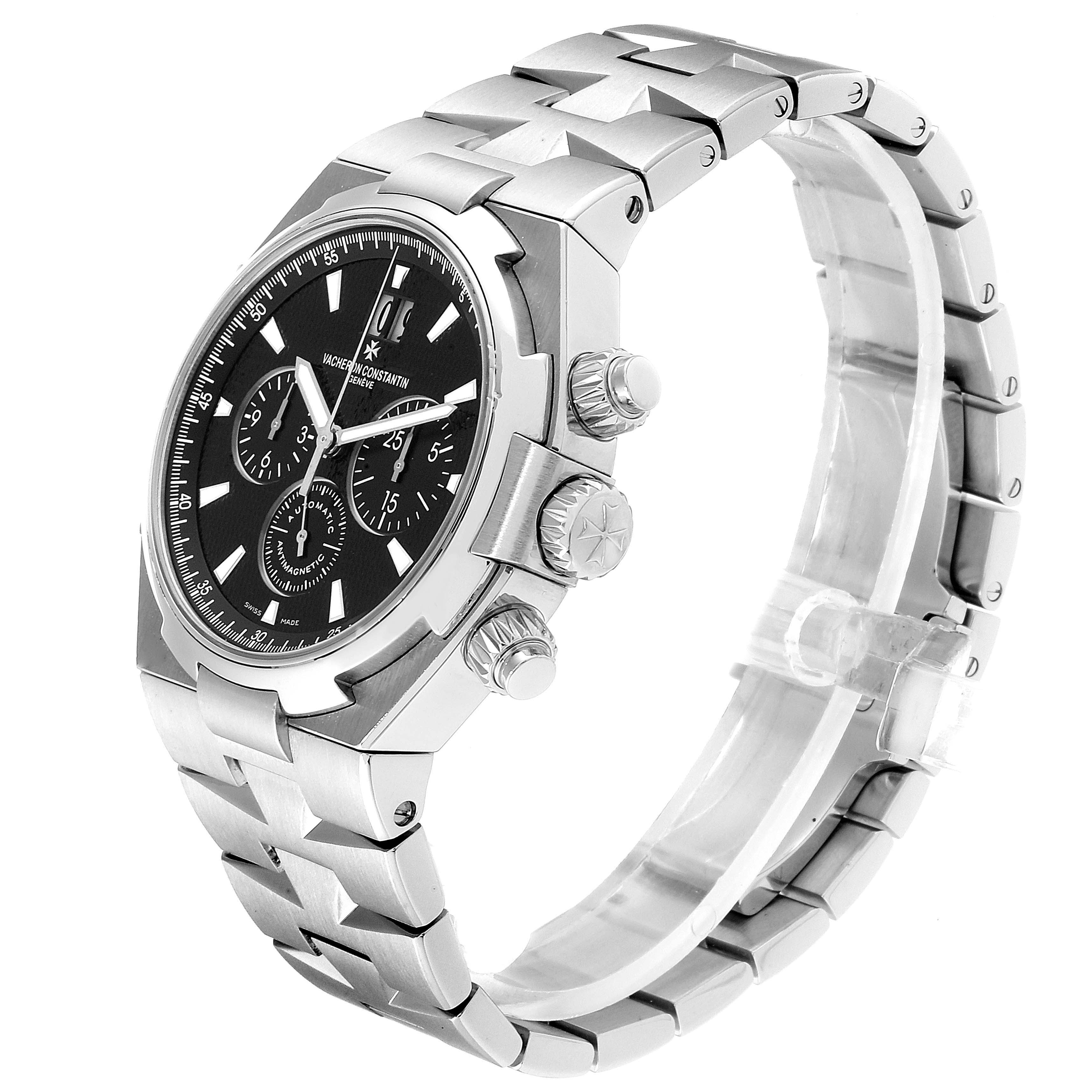 The Vacheron Constantin Overseas 49150.B01A.9097 Men's Stainless Steel Black Dial 49150.B01A.9097 Men's Stainless Steel Black Dial watch is shown at a three-quarter angle displaying the face, bezel, crown, and part of the bracelet.