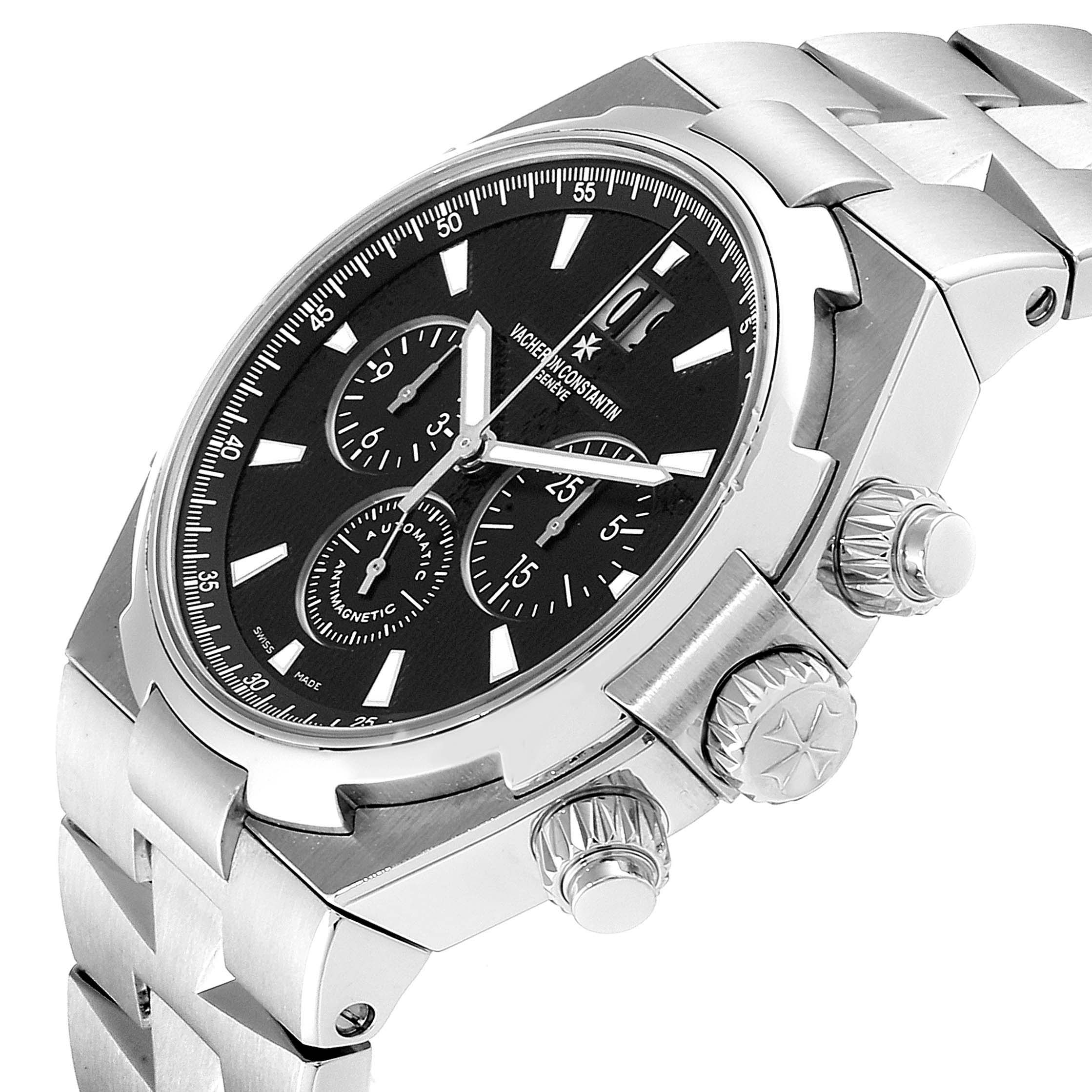 The image shows a side angle of the Vacheron Constantin Overseas 49150.B01A.9097 Men's Stainless Steel Black Dial 49150.B01A.9097 Men's Stainless Steel Black Dial watch, highlighting its crown, chronograph pushers, and steel bracelet.