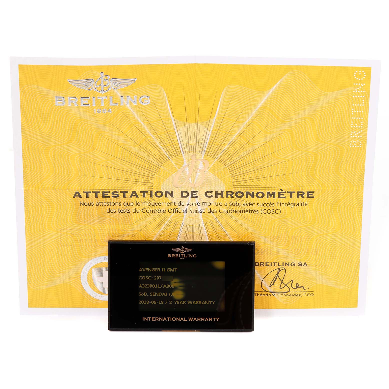 The image shows certification and an international warranty card for a Breitling Avenger A3239011-C872-170A Men's Stainless Steel Mother of Pearl Dial A3239011-C872-170A Men's Stainless Steel Mother of Pearl Dial II GMT watch.