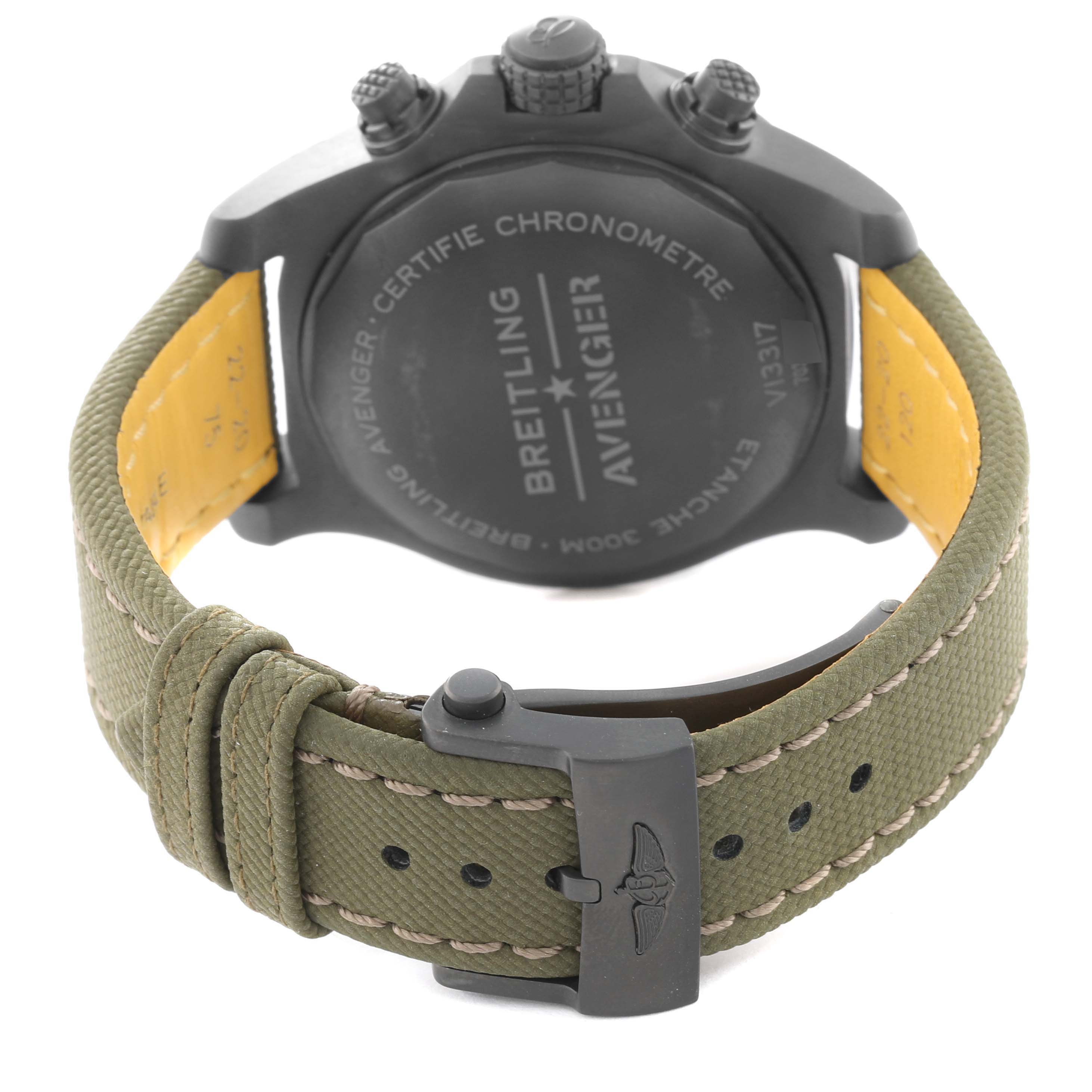 The image shows the back of the Breitling Avenger V13317 Men's Titanium Green Dial V13317 Men's Titanium Green Dial watch, including the case back and part of the green band with a buckle.