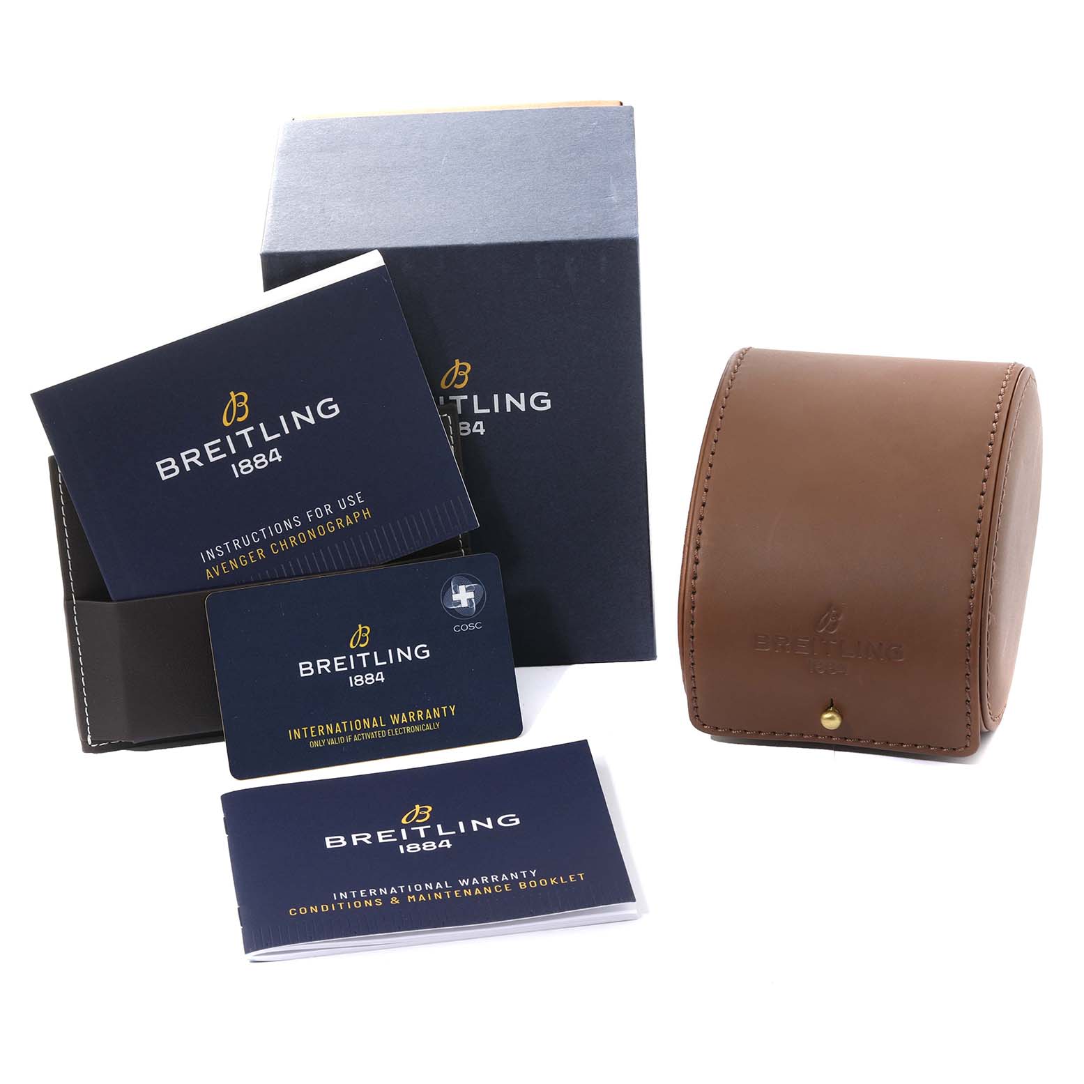 The image shows the Breitling Avenger V13317 Men's Titanium Green Dial V13317 Men's Titanium Green Dial watch packaging, including manuals, warranty cards, a case, and a box.