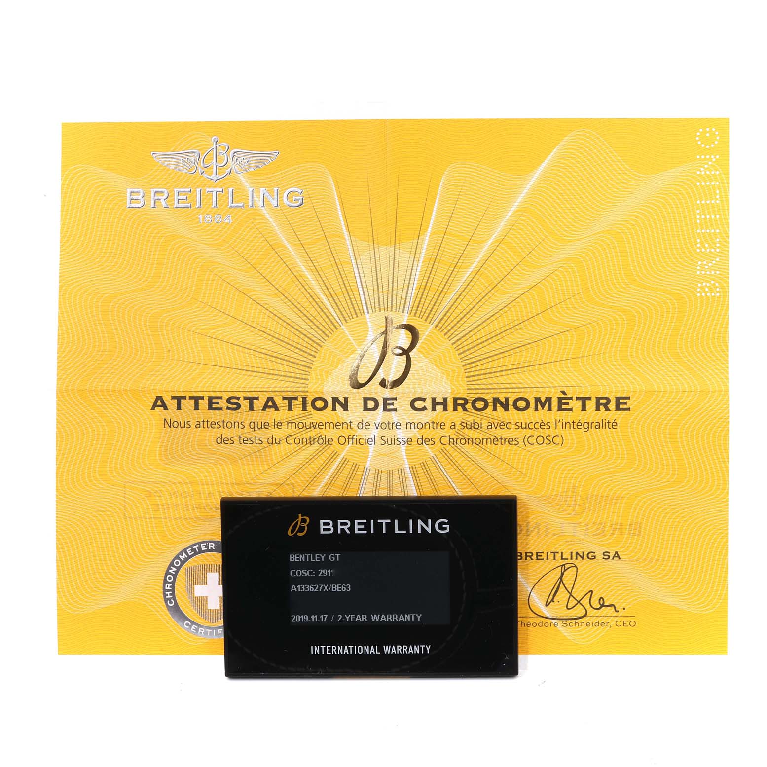 The image shows the international warranty card and attestation de chronomètre for a Bentley GT model by Breitling.