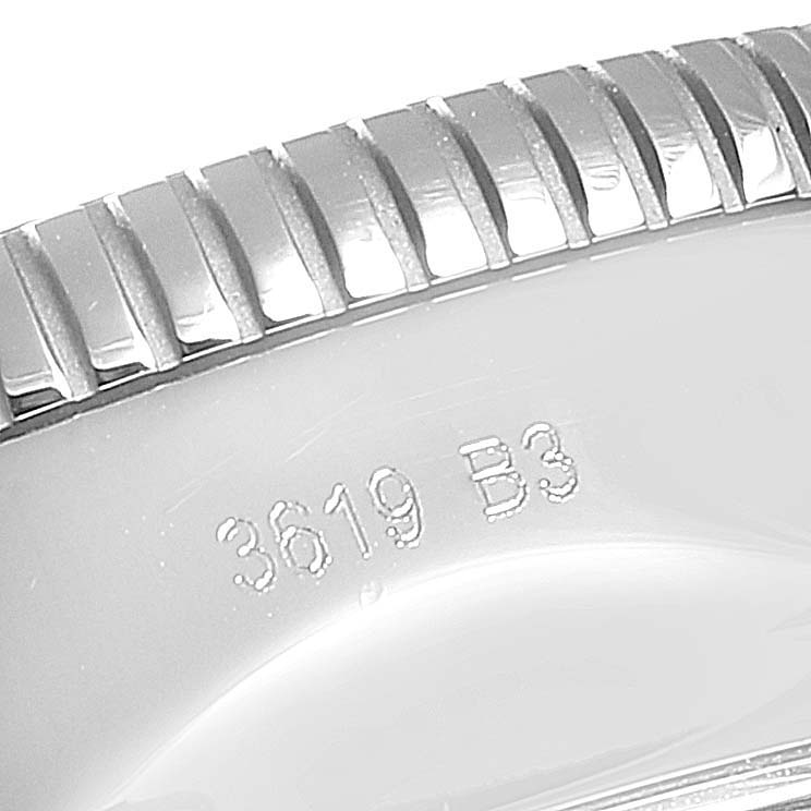 This close-up image shows the ridged bezel and engraved numbers on the case side of a Breitling Superocean AB2010161C1A1 Men
s Stainless Steel Blue Dial AB2010161C1A1 Men
s Stainless Steel Blue Dial watch.