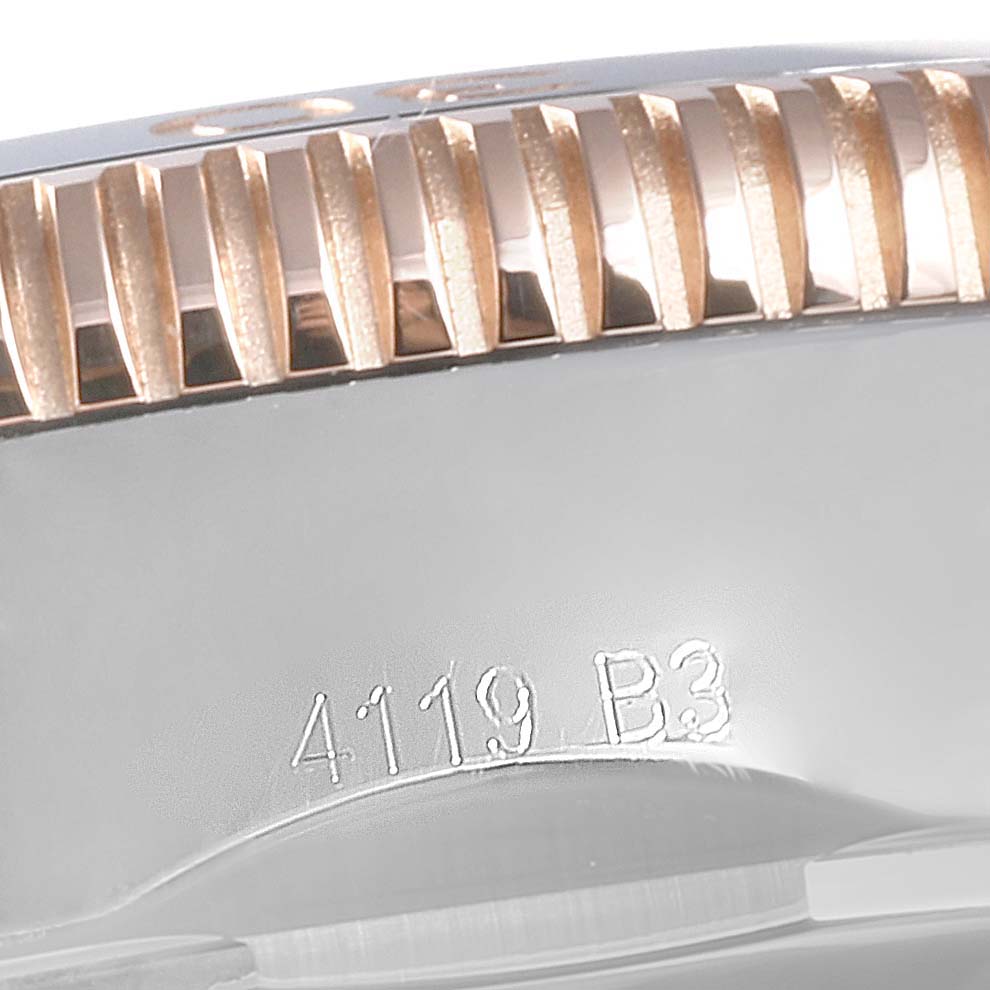 This close-up image of the Breitling Superocean U1331312/BG50/279S/A20D.4 Men's Stainless Steel Black Dial U1331312/BG50/279S/A20D.4 Men's Stainless Steel Black Dial watch shows its side profile, highlighting the bezel and engraved serial number.