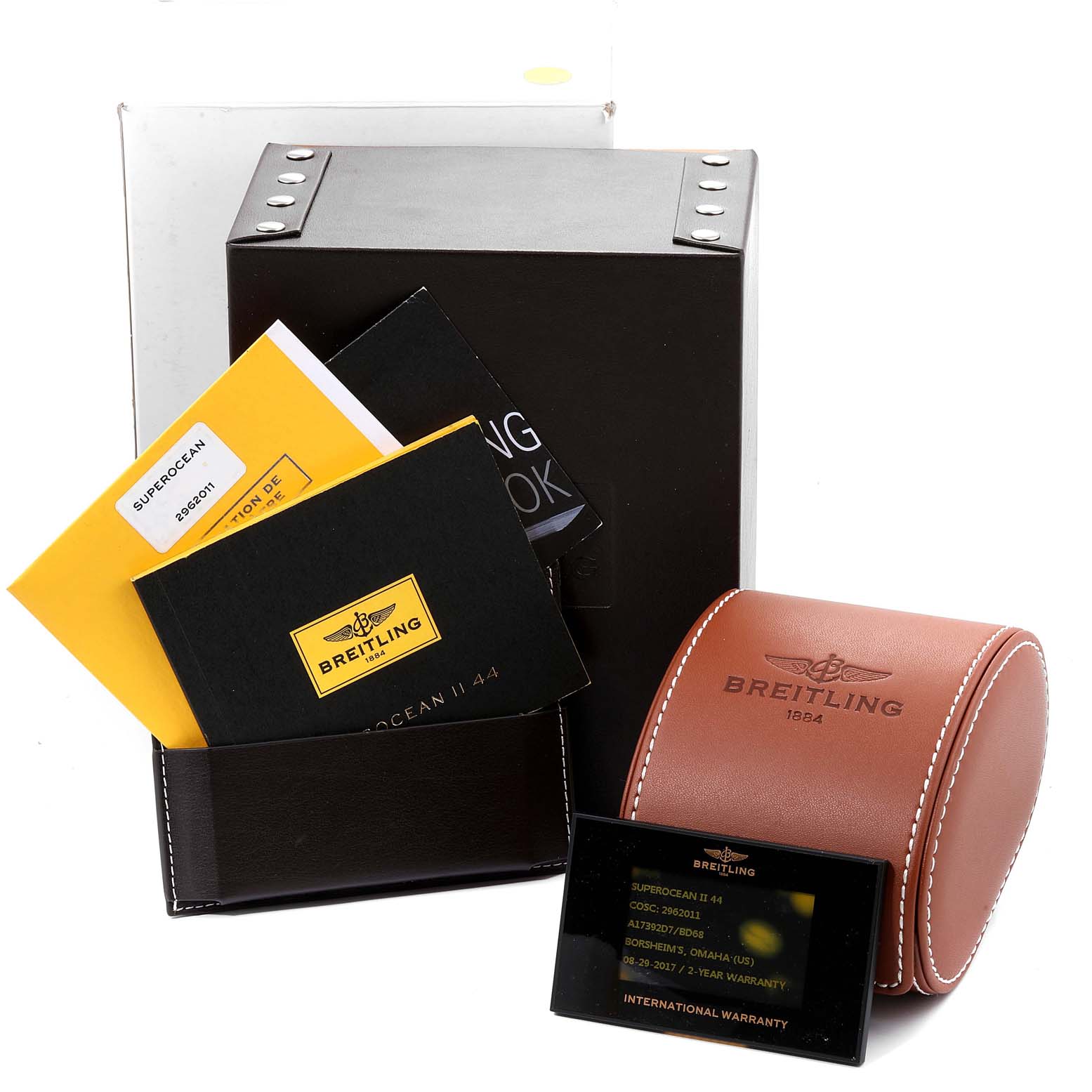 The image shows a Breitling Superocean A17392D8/C910 Men
s Stainless Steel Black Dial A17392D8/C910 Men
s Stainless Steel Black Dial watch box, manual, warranty card, and leather case from an angled perspective.