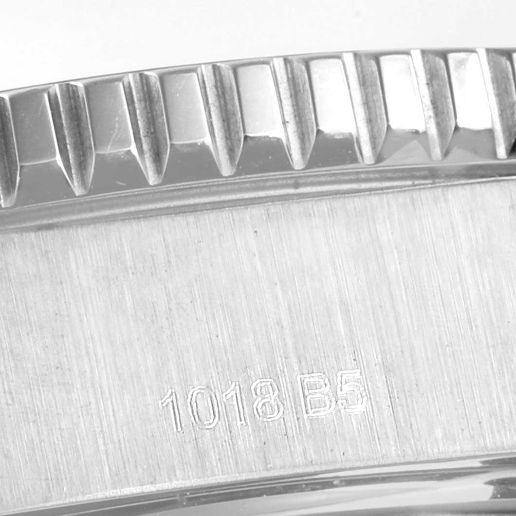 This image shows a close-up of the bezel and case side of the Breitling Superocean A17392D8/C910 Men
s Stainless Steel Black Dial A17392D8/C910 Men
s Stainless Steel Black Dial watch, including an engraved serial number.