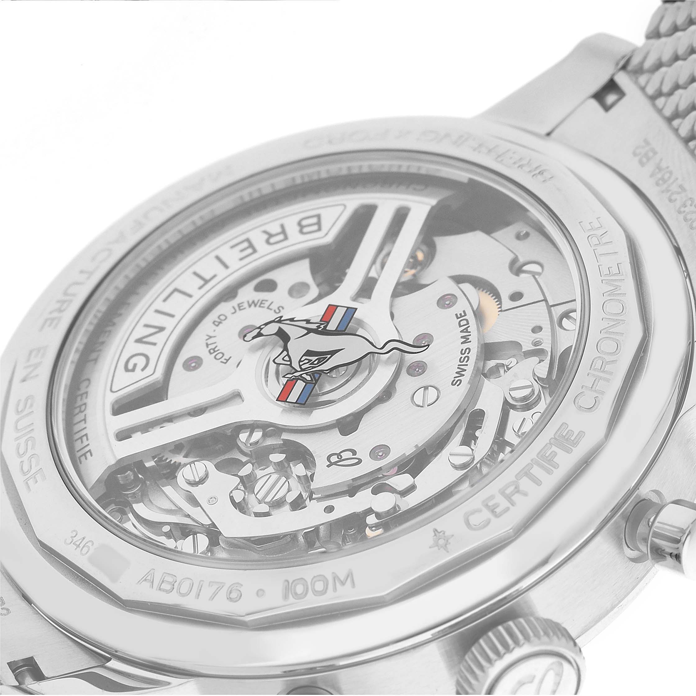 The image shows the Breitling Premier AB01762A1L1A1 Men's Stainless Steel Green Dial watch's case back, detailing the automatic movement and inscriptions.