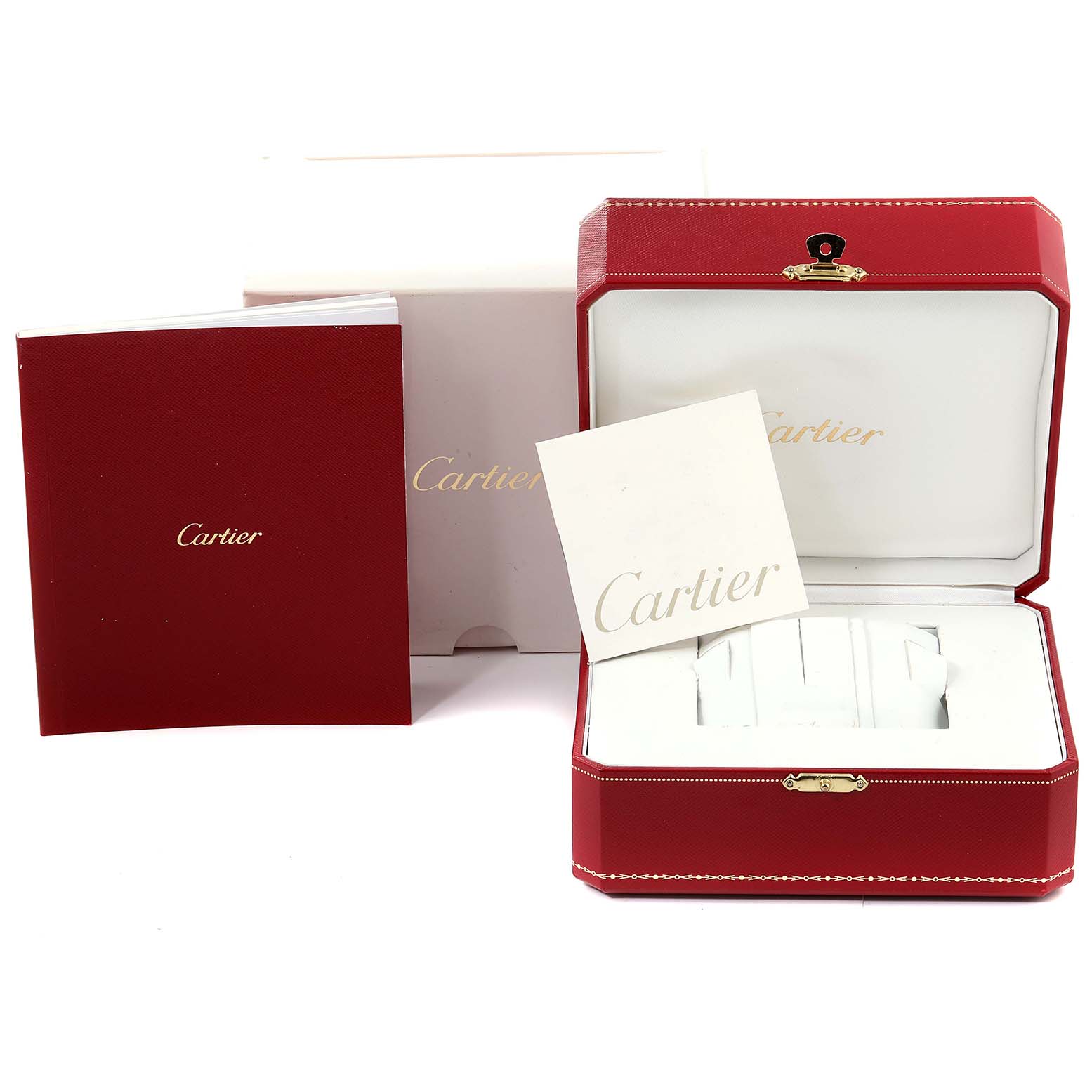 This image shows the packaging and accessories for a Calibre de Cartier watch by Cartier, including a red box, documents, and a white insert.