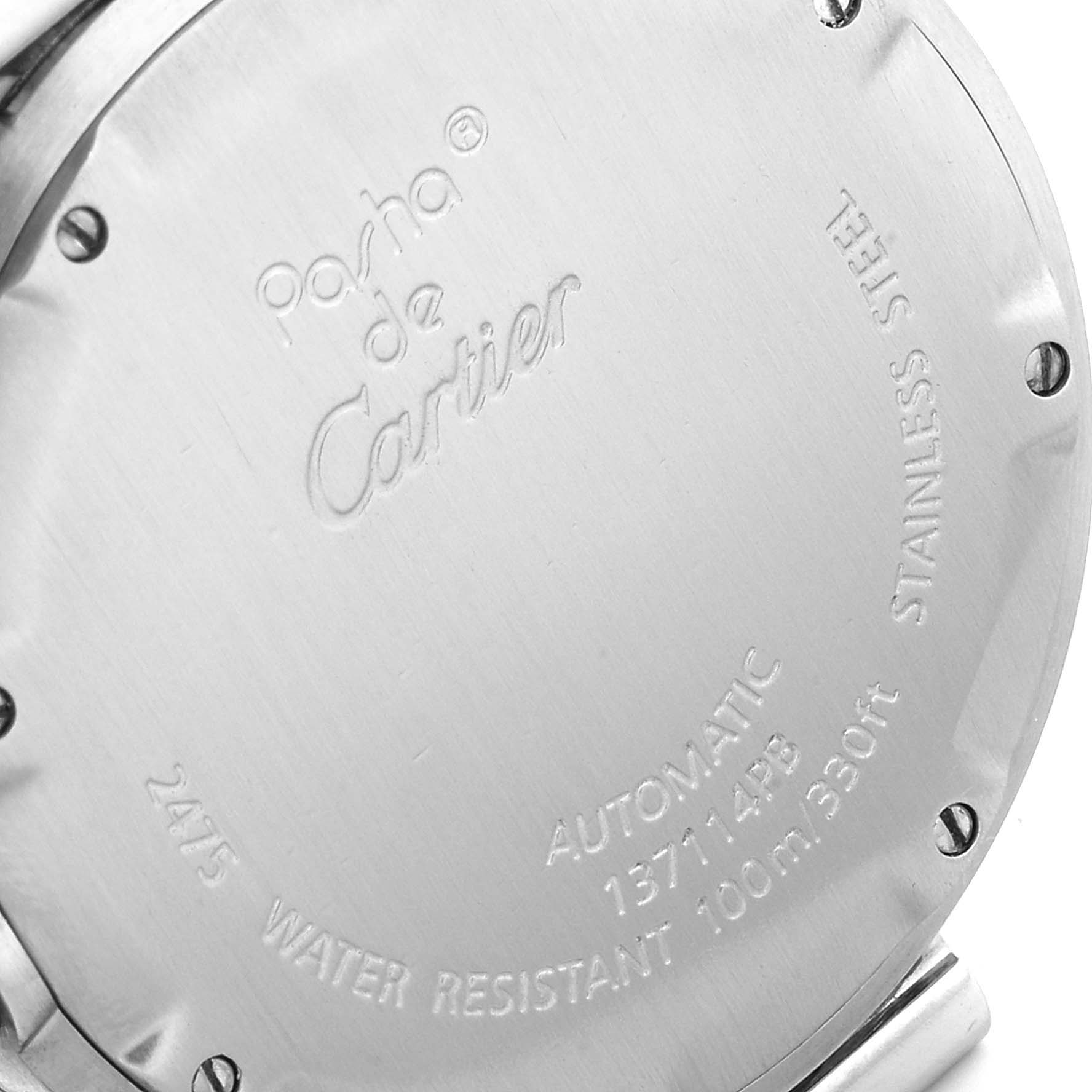 This image shows the case back of a Cartier Pasha W31058M7 Women's Stainless Steel Pink Dial W31058M7 Women's Stainless Steel Pink Dial model watch in a close-up view.