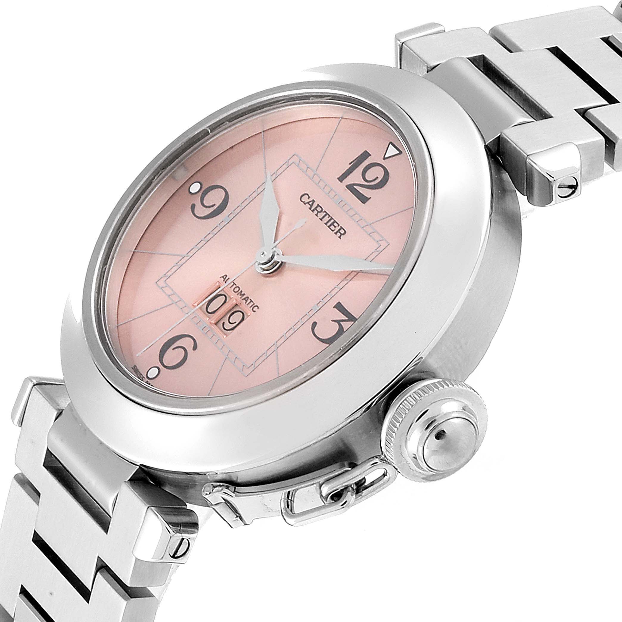 The Cartier Pasha W31058M7 Women's Stainless Steel Pink Dial W31058M7 Women's Stainless Steel Pink Dial watch is shown at an angle highlighting its pink dial, case, crown, and part of the bracelet.