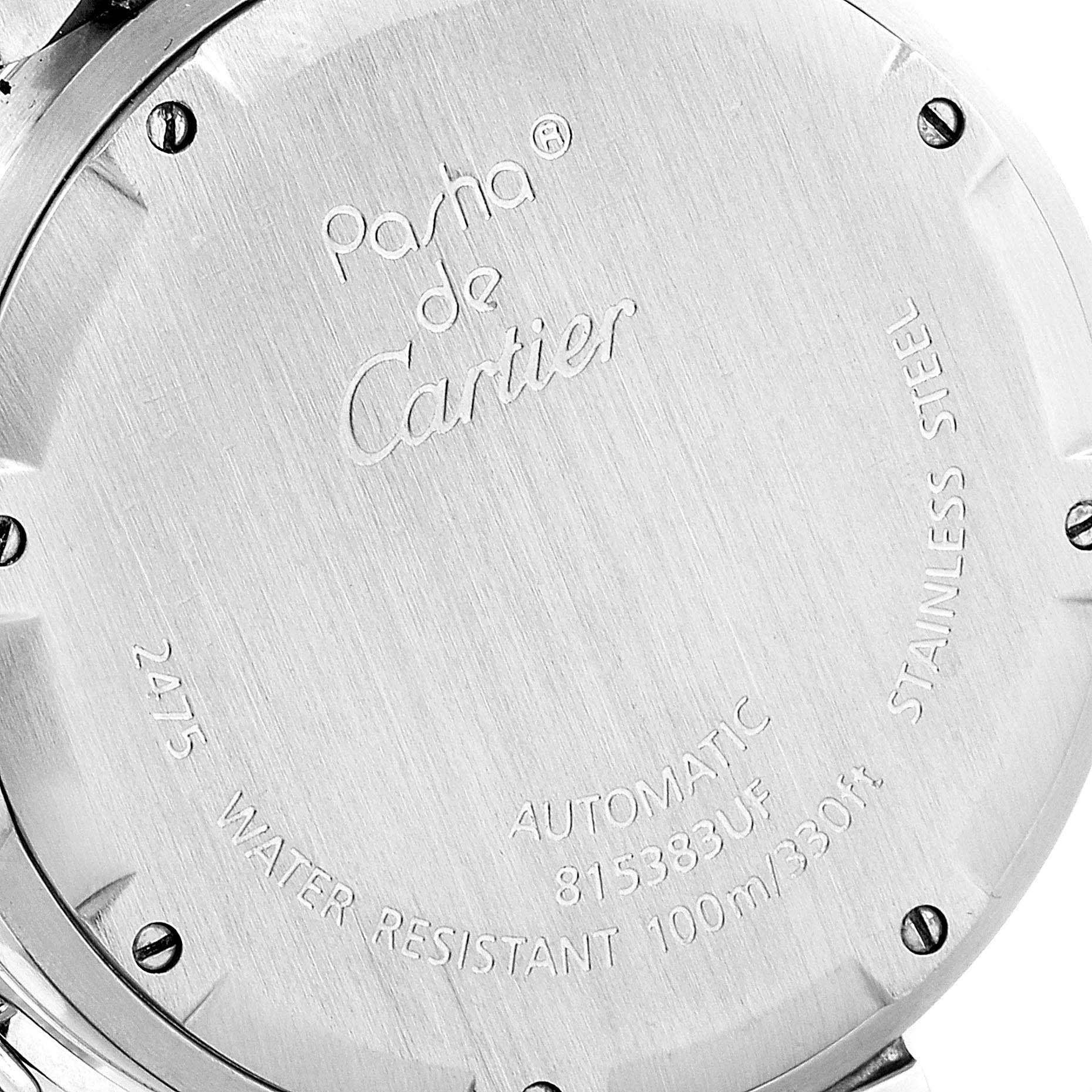 This image shows the back of a Cartier Pasha W31053M7 Women's Stainless Steel Black Dial W31053M7 Women's Stainless Steel Black Dial model watch, displaying its engraved details and screws.
