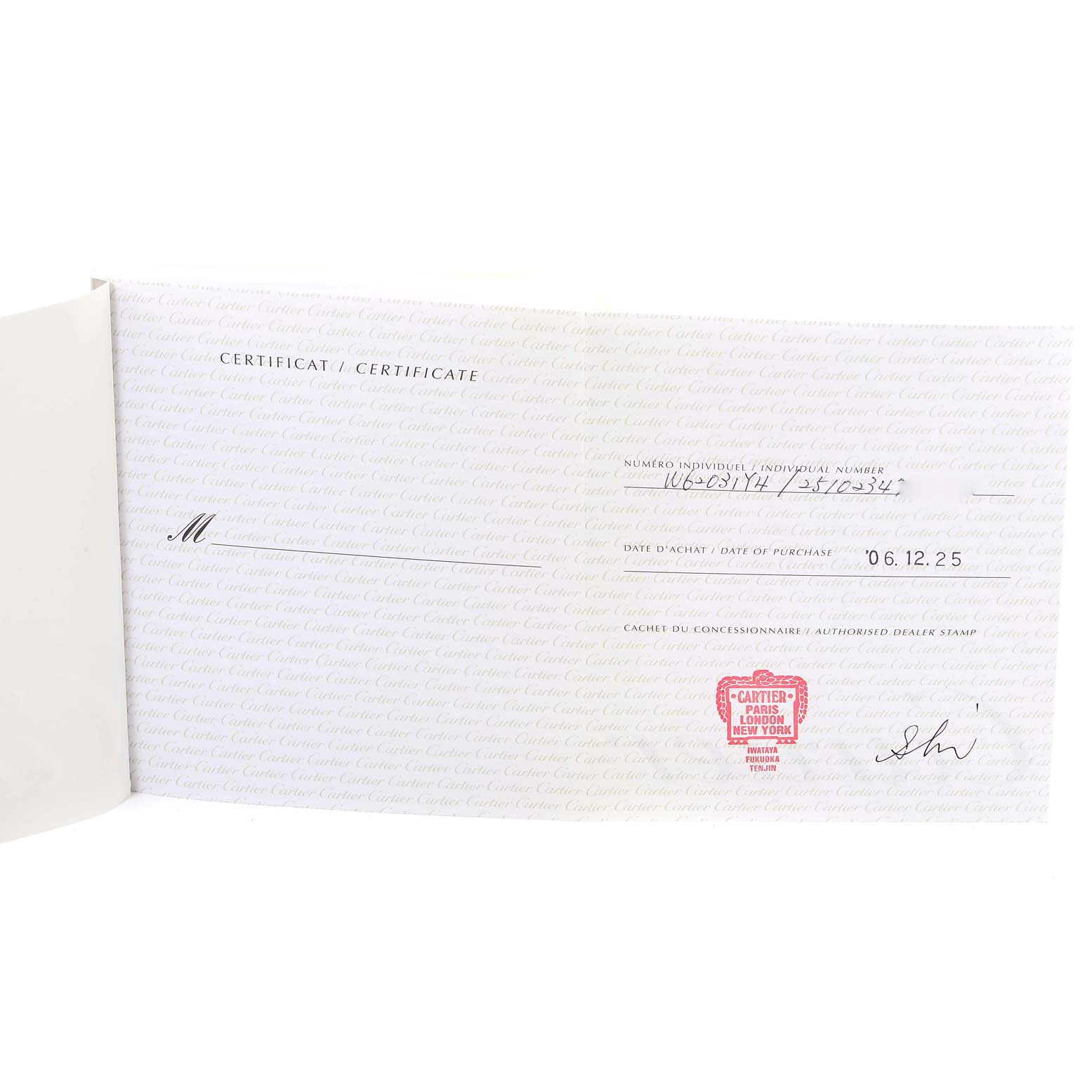 The image shows a certification booklet opened to a page for the Cartier Roadster W62031Y4 Men's Steel and Gold (two tone) Silver Dial W62031Y4 Men's Steel and Gold (two tone) Silver Dial model watch.