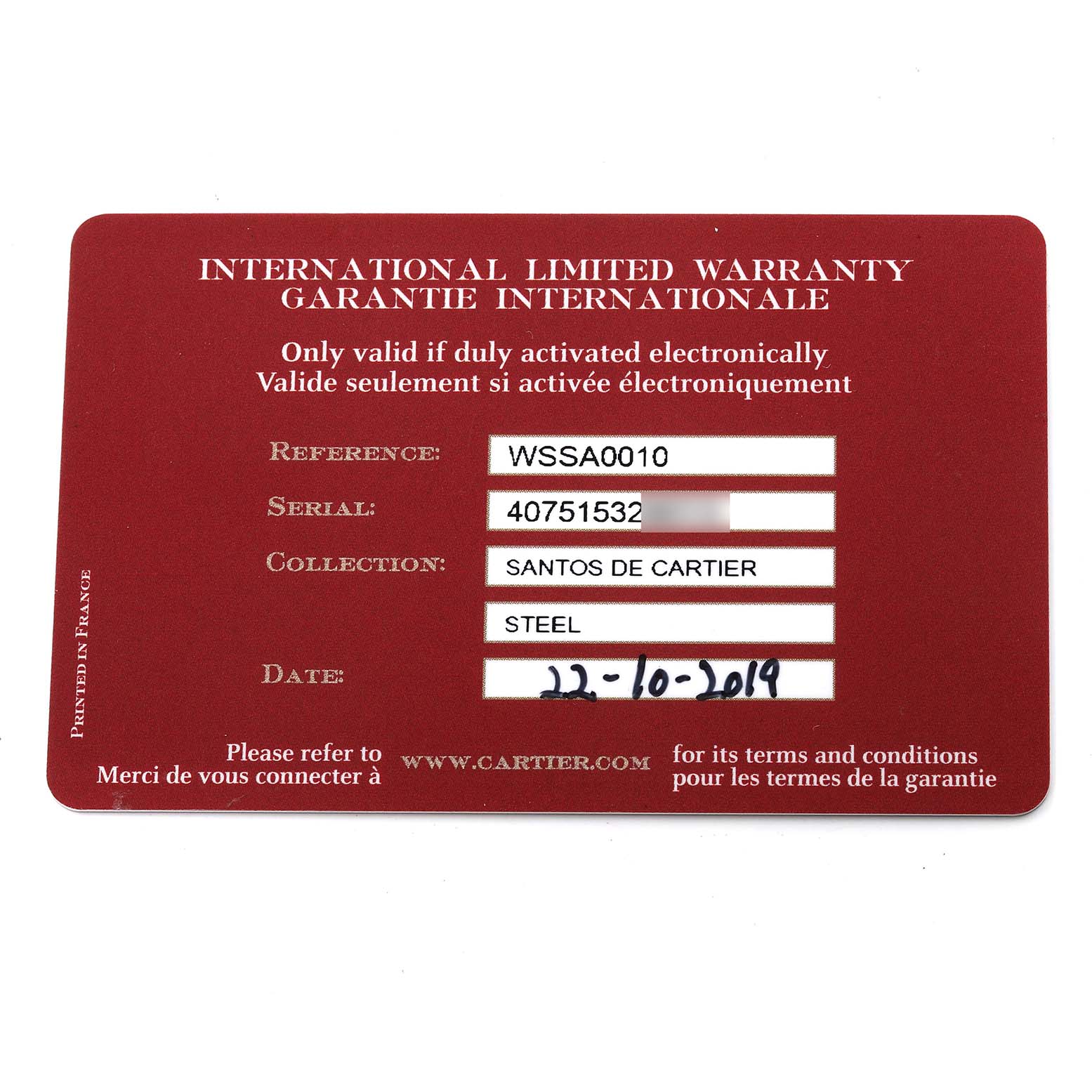 The image shows an international limited warranty card for a Santos de Cartier watch, displaying reference, serial number, and collection details.
