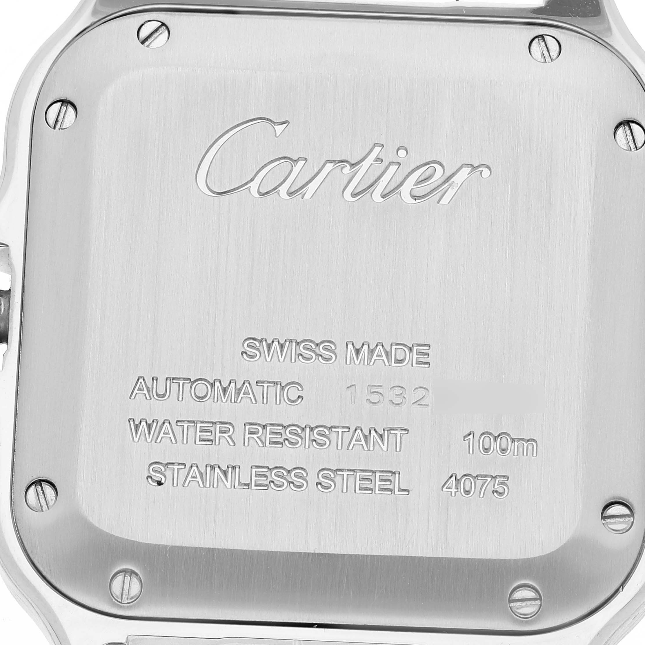 This image shows the back case of a Cartier Santos WSSA0010 Men's Stainless Steel Silver Dial WSSA0010 Men's Stainless Steel Silver Dial watch, displaying details like "Swiss Made," "Automatic," and water resistance.