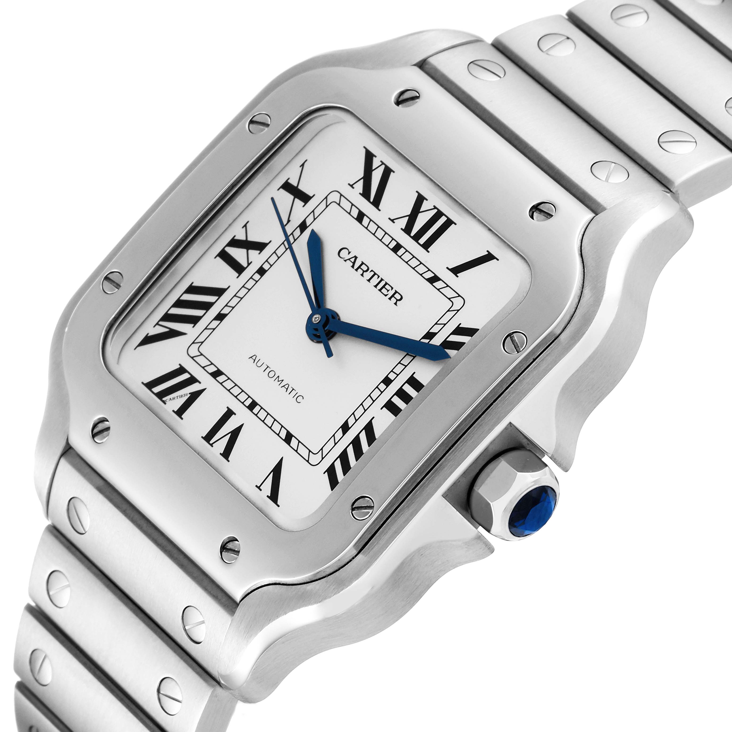 This image shows a close-up of the face and part of the bracelet of a Cartier Santos WSSA0010 Men's Stainless Steel Silver Dial WSSA0010 Men's Stainless Steel Silver Dial watch, viewed from an oblique angle.