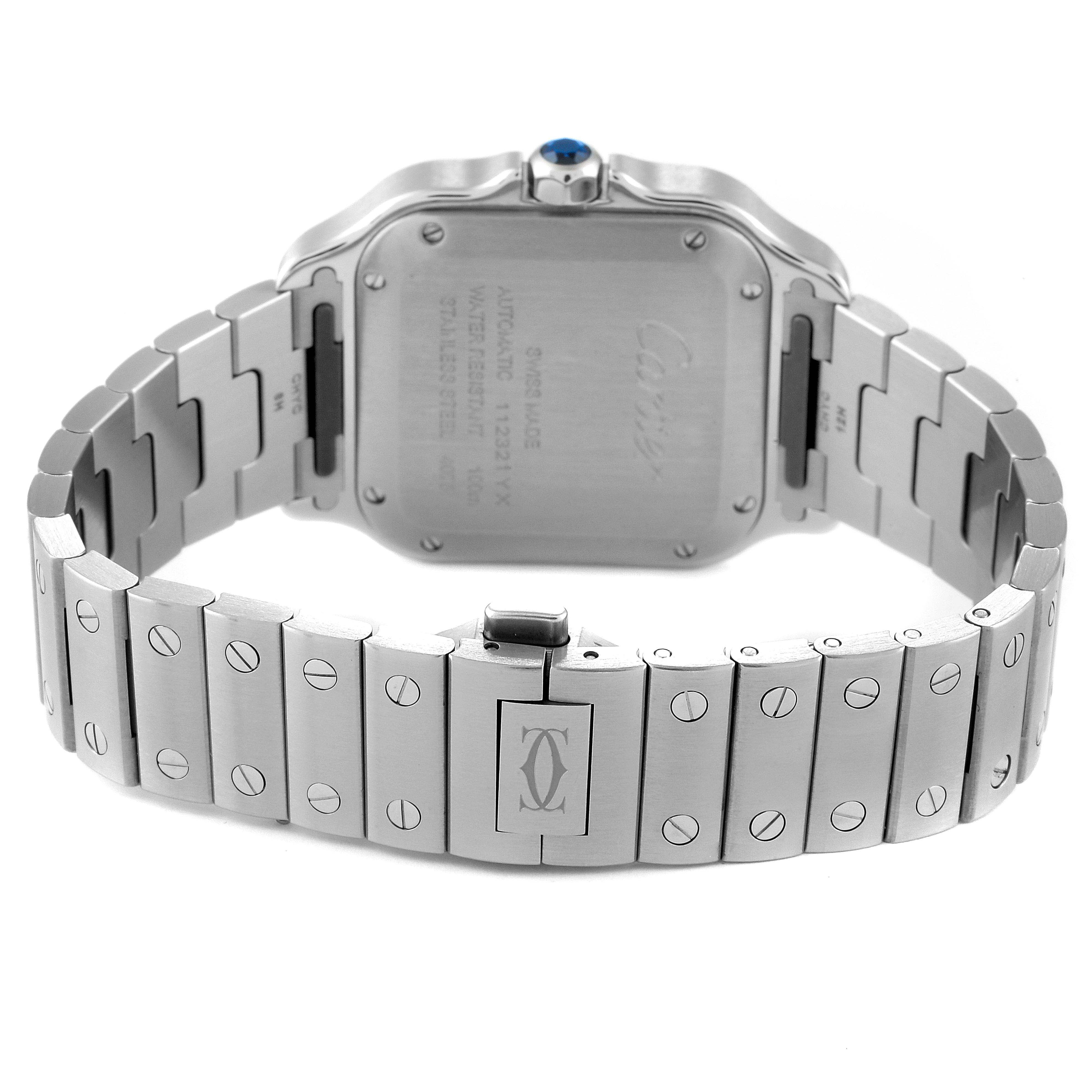 This image shows the back case and stainless steel bracelet of the Cartier Santos WSSA0010 Men's Stainless Steel Silver Dial WSSA0010 Men's Stainless Steel Silver Dial watch, highlighting the engraved details and clasp.