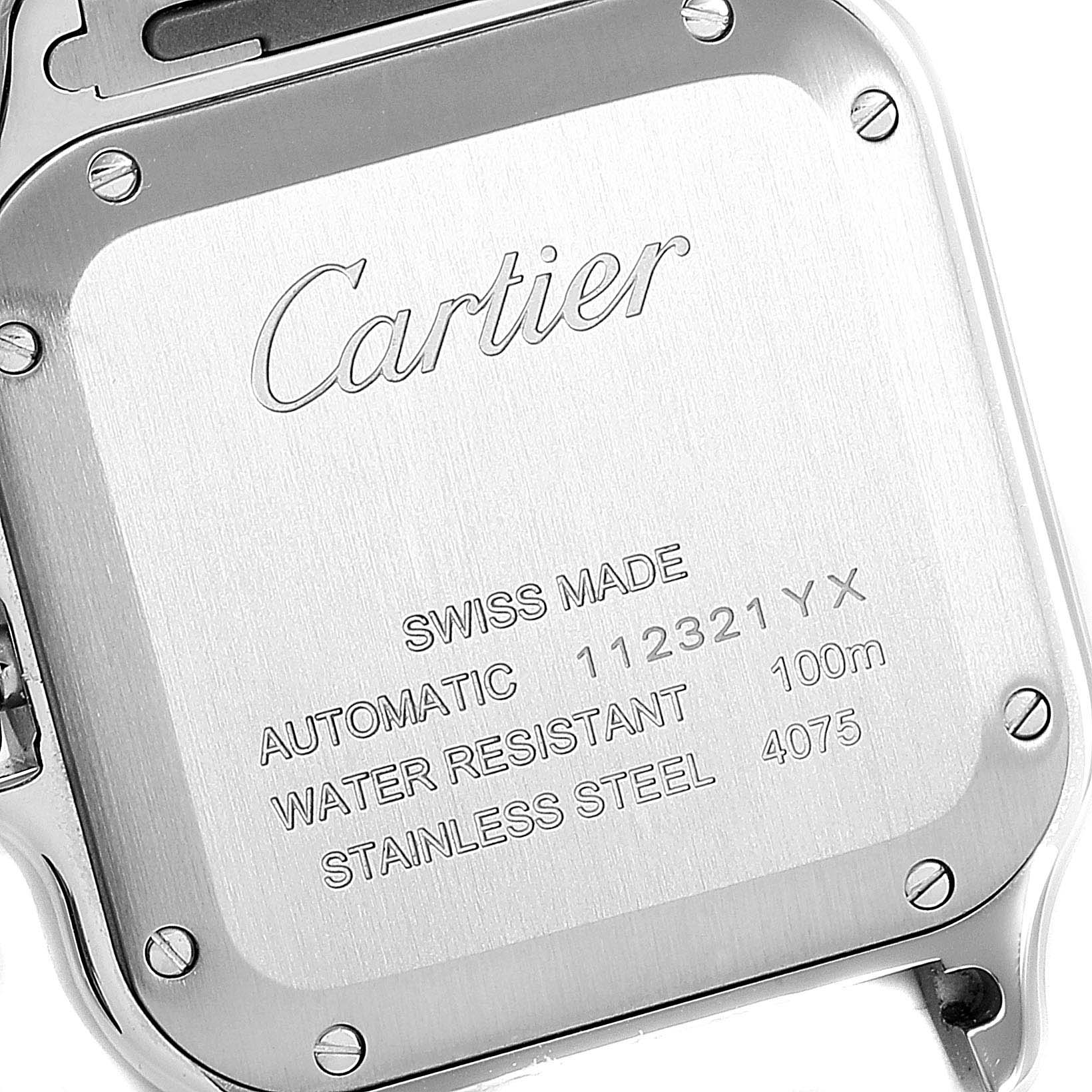 The image shows the back of a Cartier Santos WSSA0010 Men's Stainless Steel Silver Dial WSSA0010 Men's Stainless Steel Silver Dial watch, highlighting the branding and specifications engraved on the case.