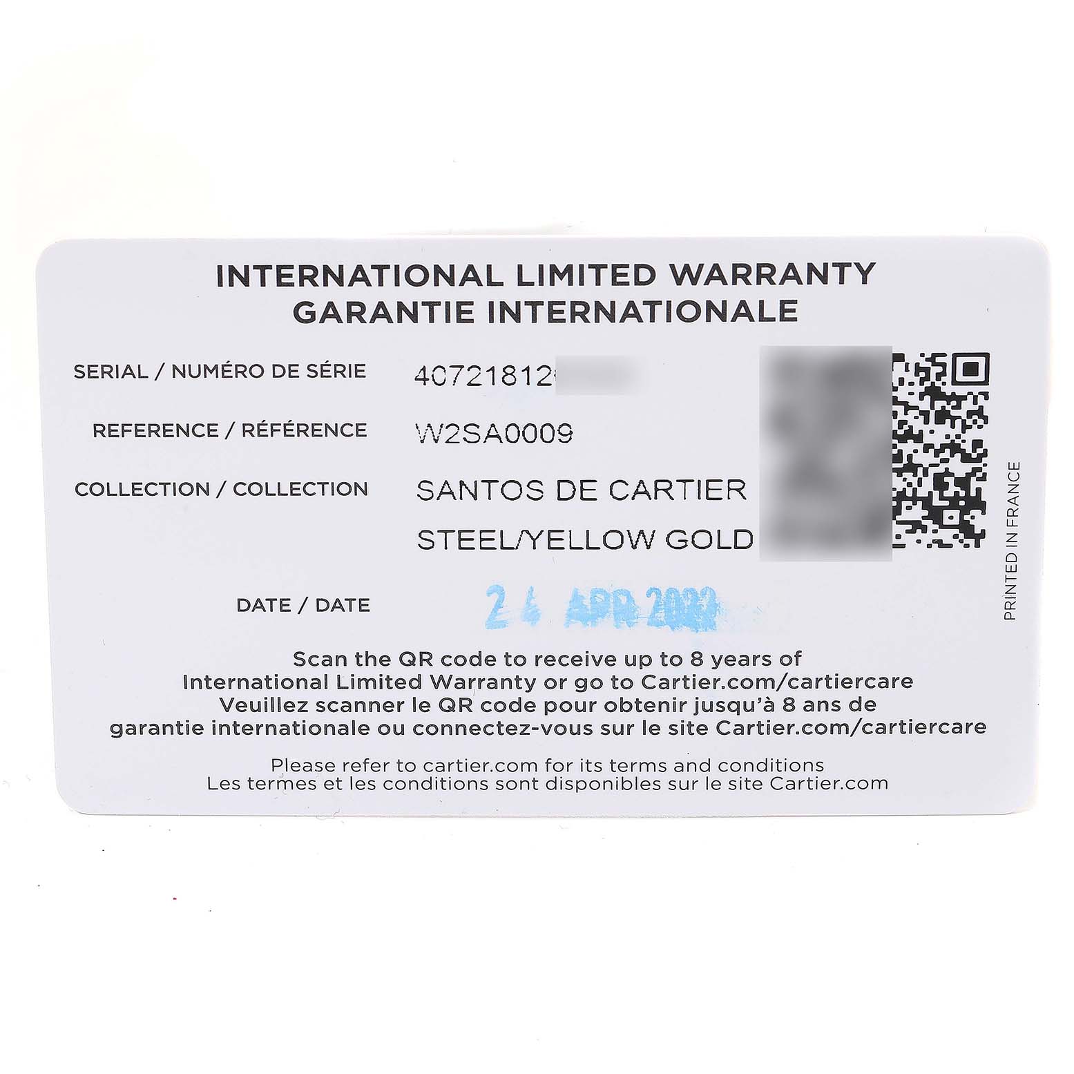 The image shows the International Limited Warranty card for a Cartier Santos W2SA0009 Men's Steel and Gold (two tone) Silver Dial W2SA0009 Men's Steel and Gold (two tone) Silver Dial de Cartier watch.