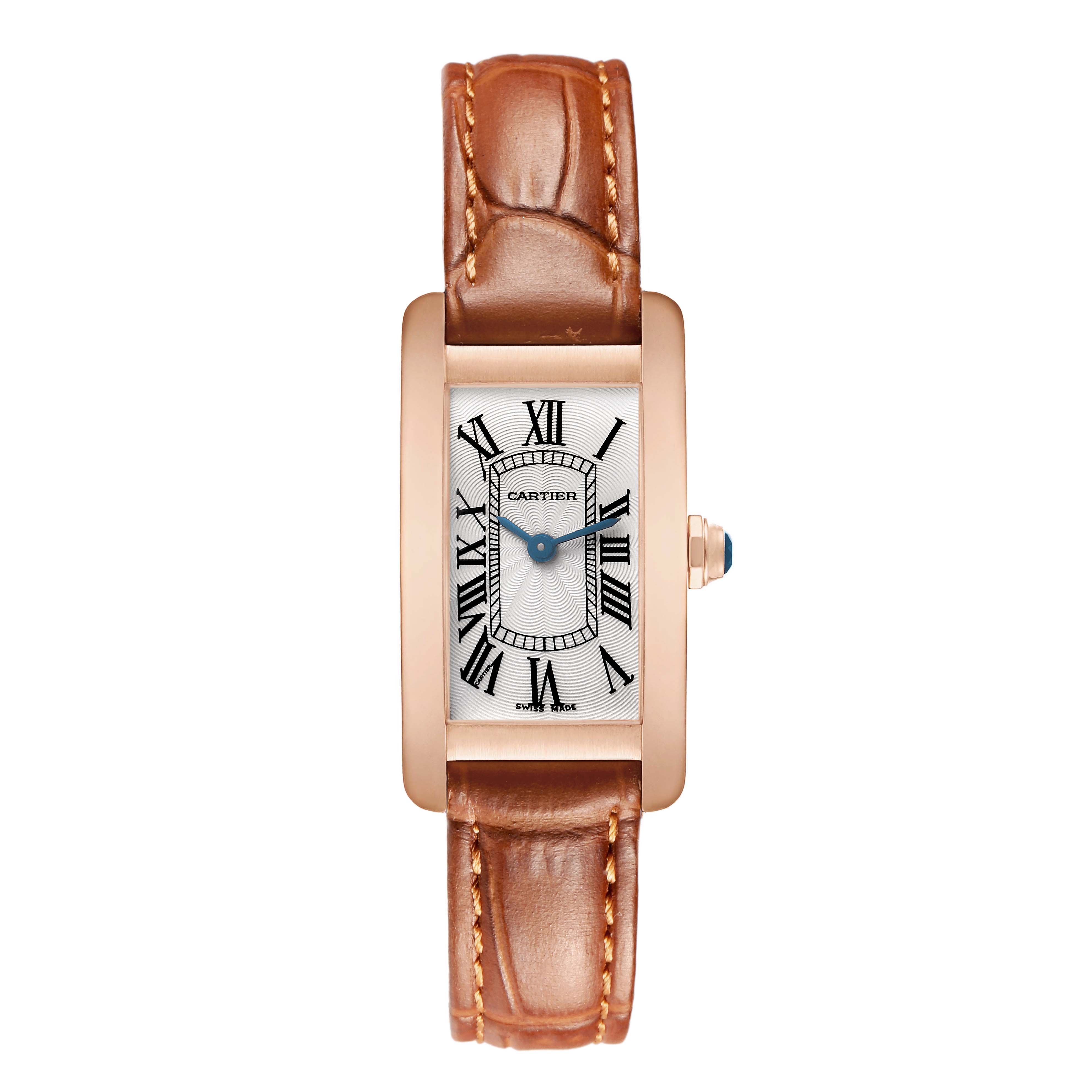 The Cartier Tank Américaine watch is shown from a front angle, displaying its face, Roman numerals, and brown leather strap.