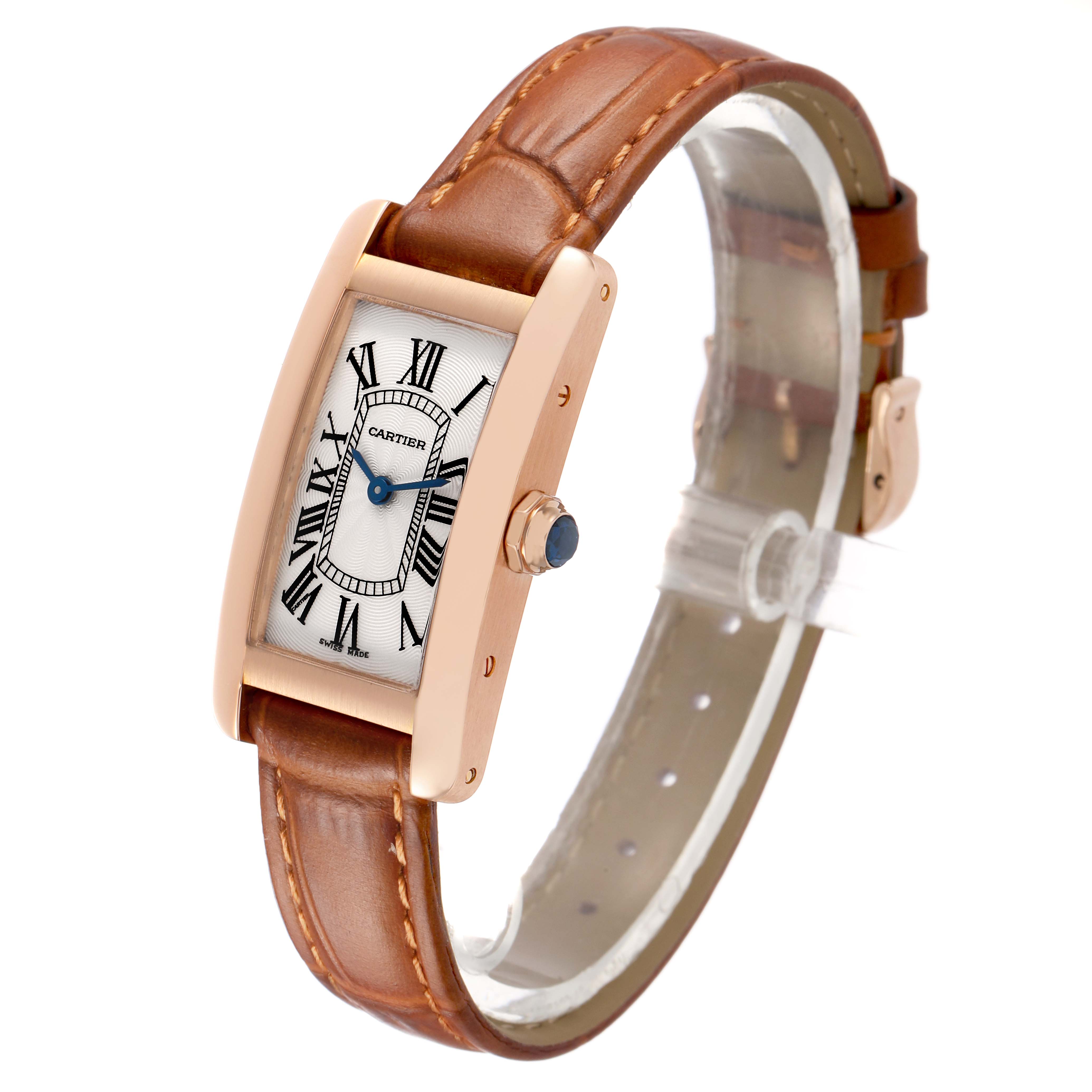 The Cartier Tank Americaine W2607456 Women's Rose Gold White Dial watch is shown at a slightly angled side view, displaying the face, strap, and crown.