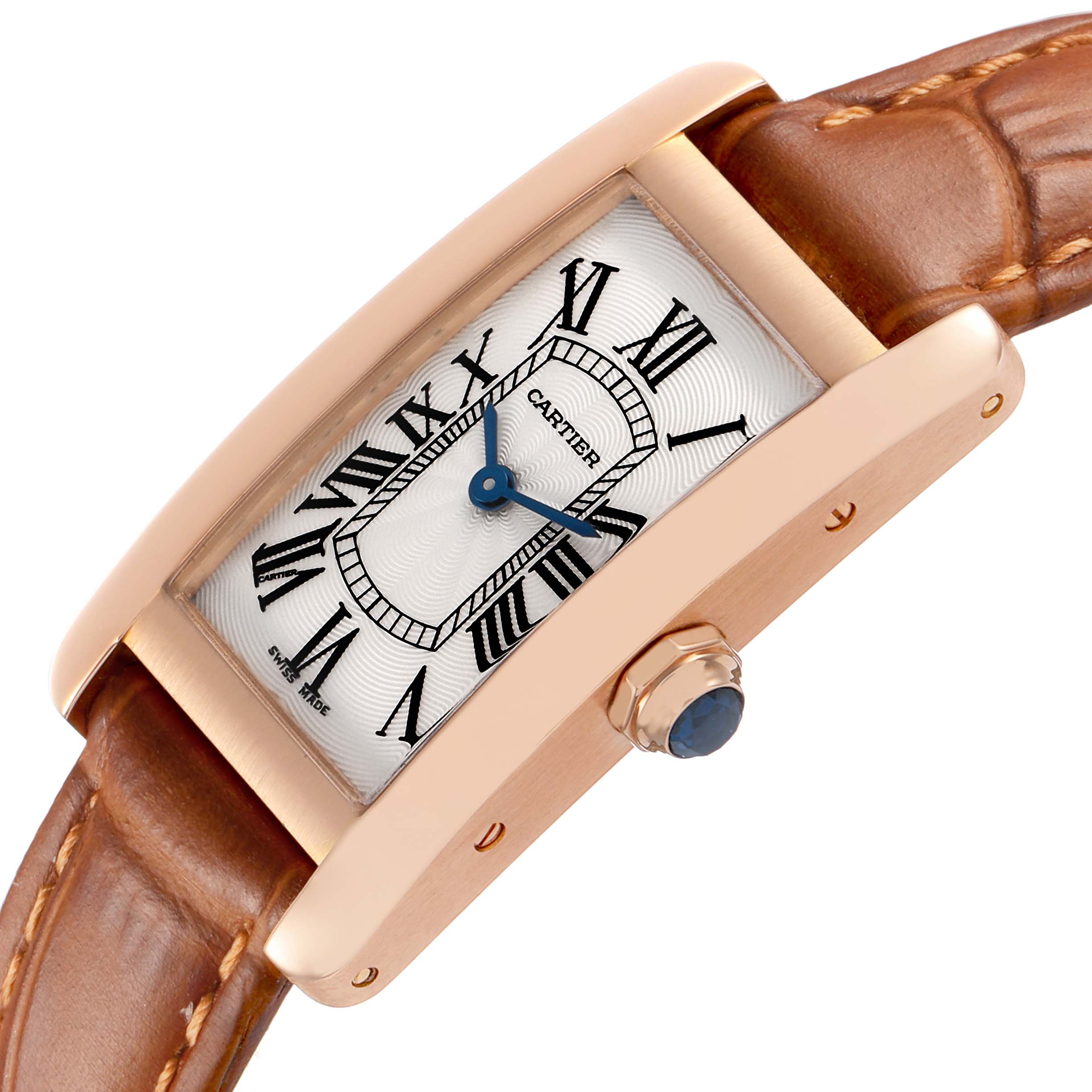 The Cartier Tank Americaine W2607456 Women's Rose Gold White Dial watch is shown at a tilted angle, highlighting its face, crown, and leather strap.