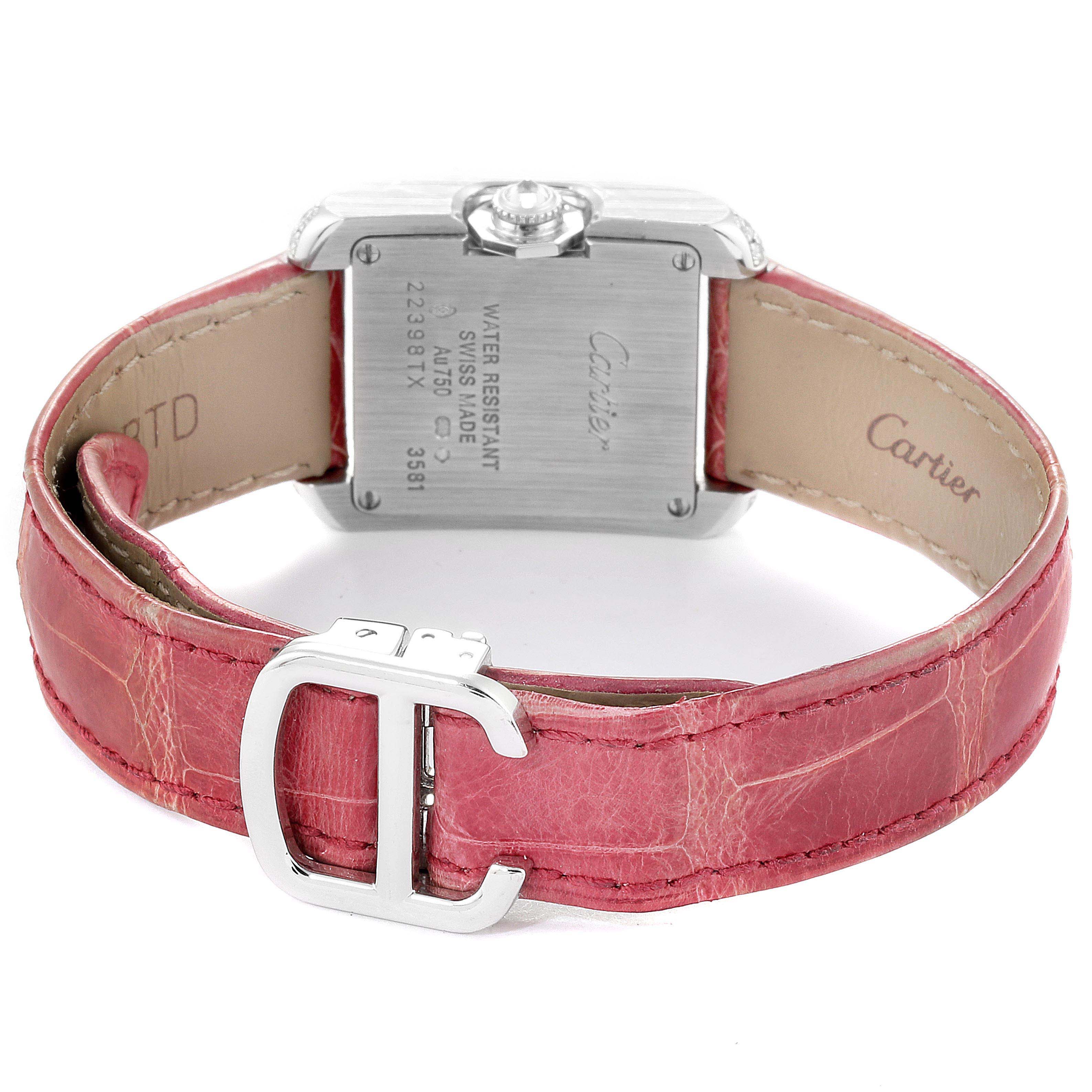 The image shows the back view of a Cartier Tank Anglaise WT100015 Women's White Gold Silver Dial WT100015 Women's White Gold Silver Dial watch, highlighting the case back, crown, and pink leather strap with buckle.