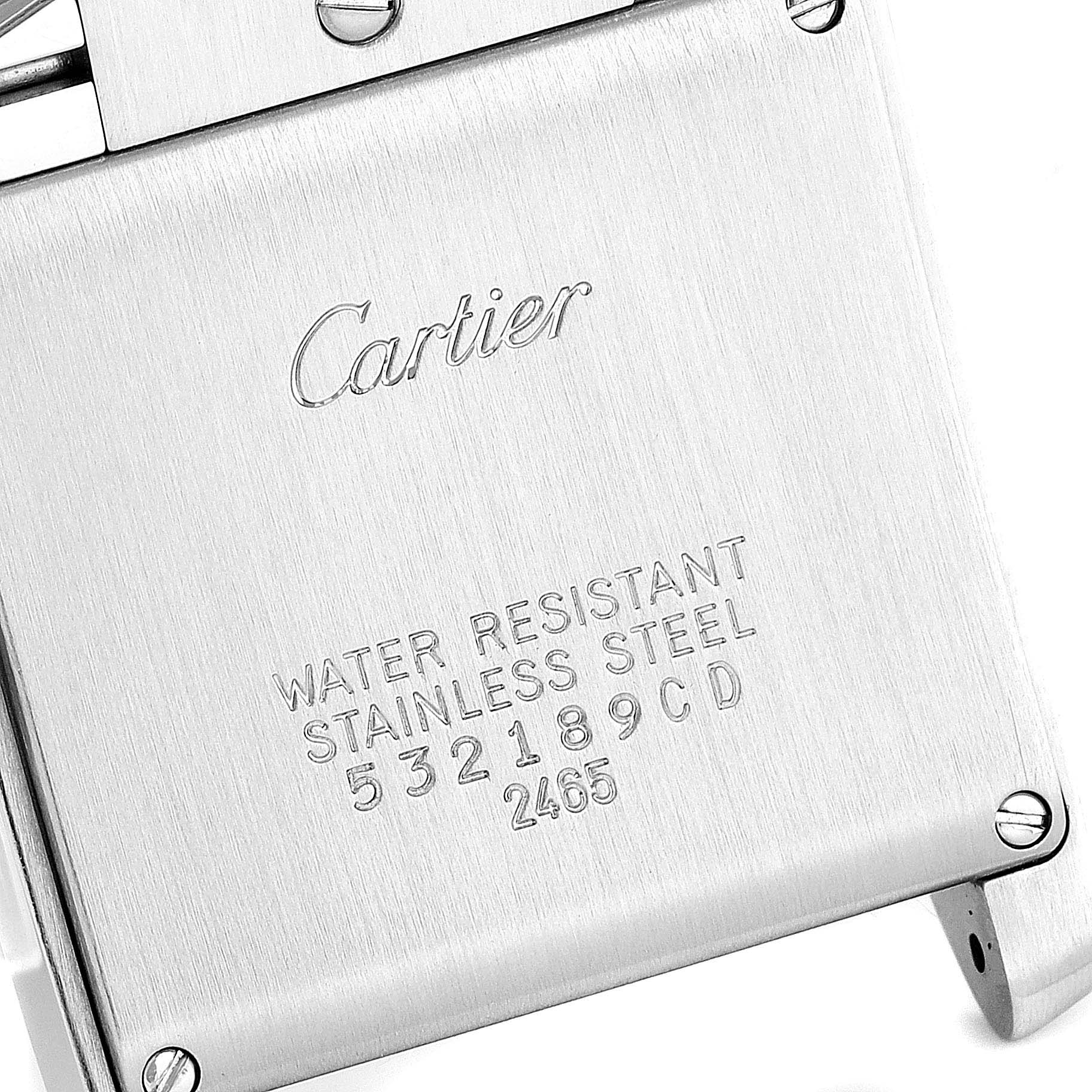 The image shows the back case of a Cartier Tank Francaise W51011Q3 Women
s Stainless Steel Silver Dial W51011Q3 Women
s Stainless Steel Silver Dial watch, displaying the brand name and model details.