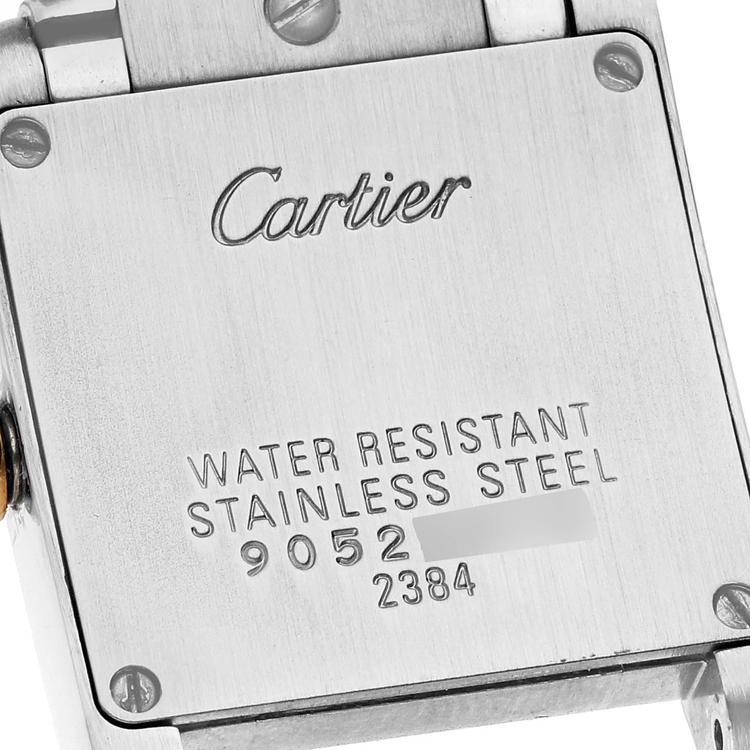 This image shows the backplate of the Cartier Tank Française watch, highlighting details like water resistance and the model number.