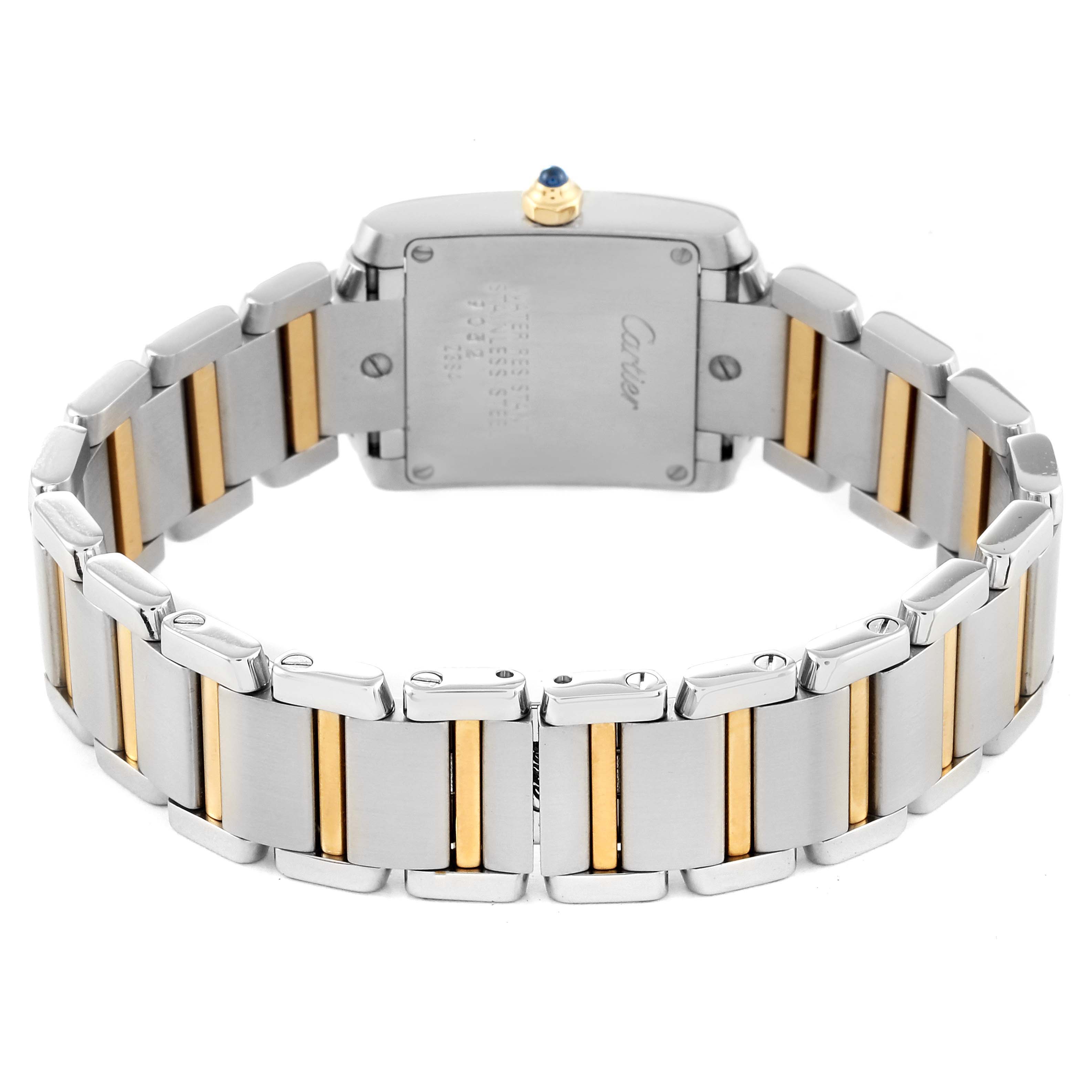 The image shows the back view of a Cartier Tank Française watch, highlighting its metallic bracelet with gold accents and case back.