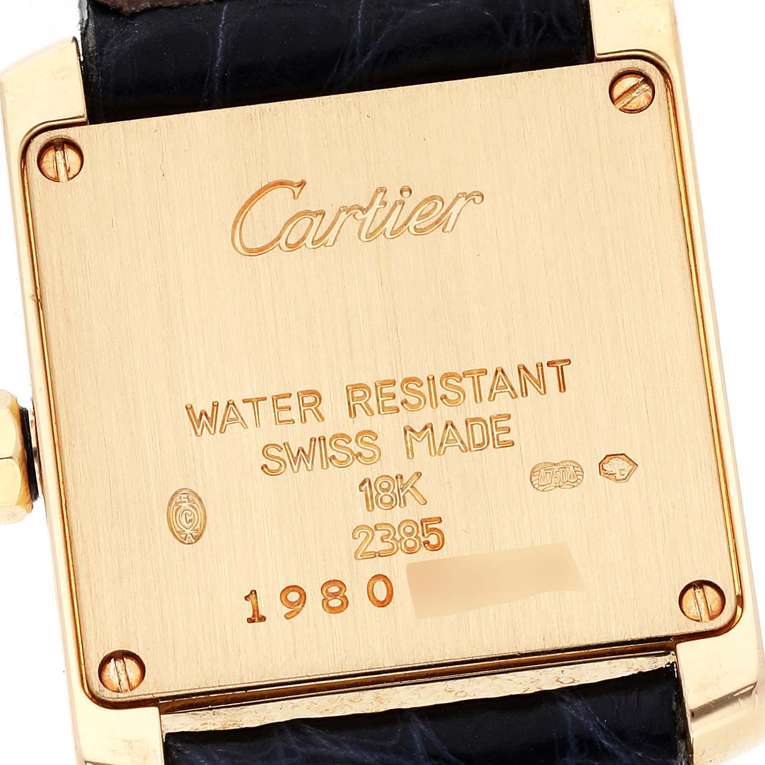 This image displays the back of a Cartier Tank Francaise W5000256 Women
s Yellow Gold Silver Dial W5000256 Women
s Yellow Gold Silver Dial watch, highlighting its case markings and strap attachment.