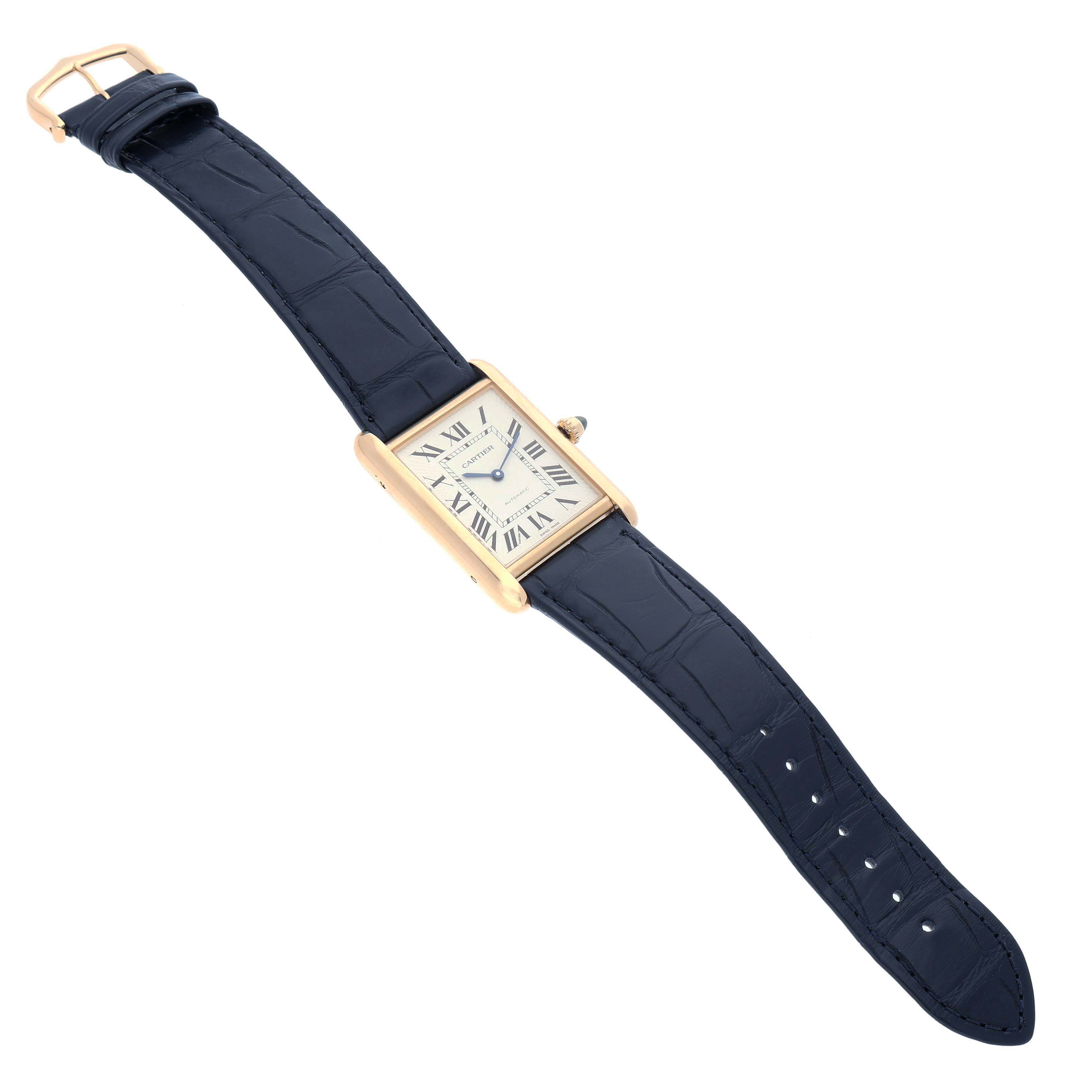 The Cartier Tank Louis WGTA0357 Men's Yellow Gold Silver Dial watch is shown at a slight angle, highlighting its rectangular face, leather strap, and gold case.