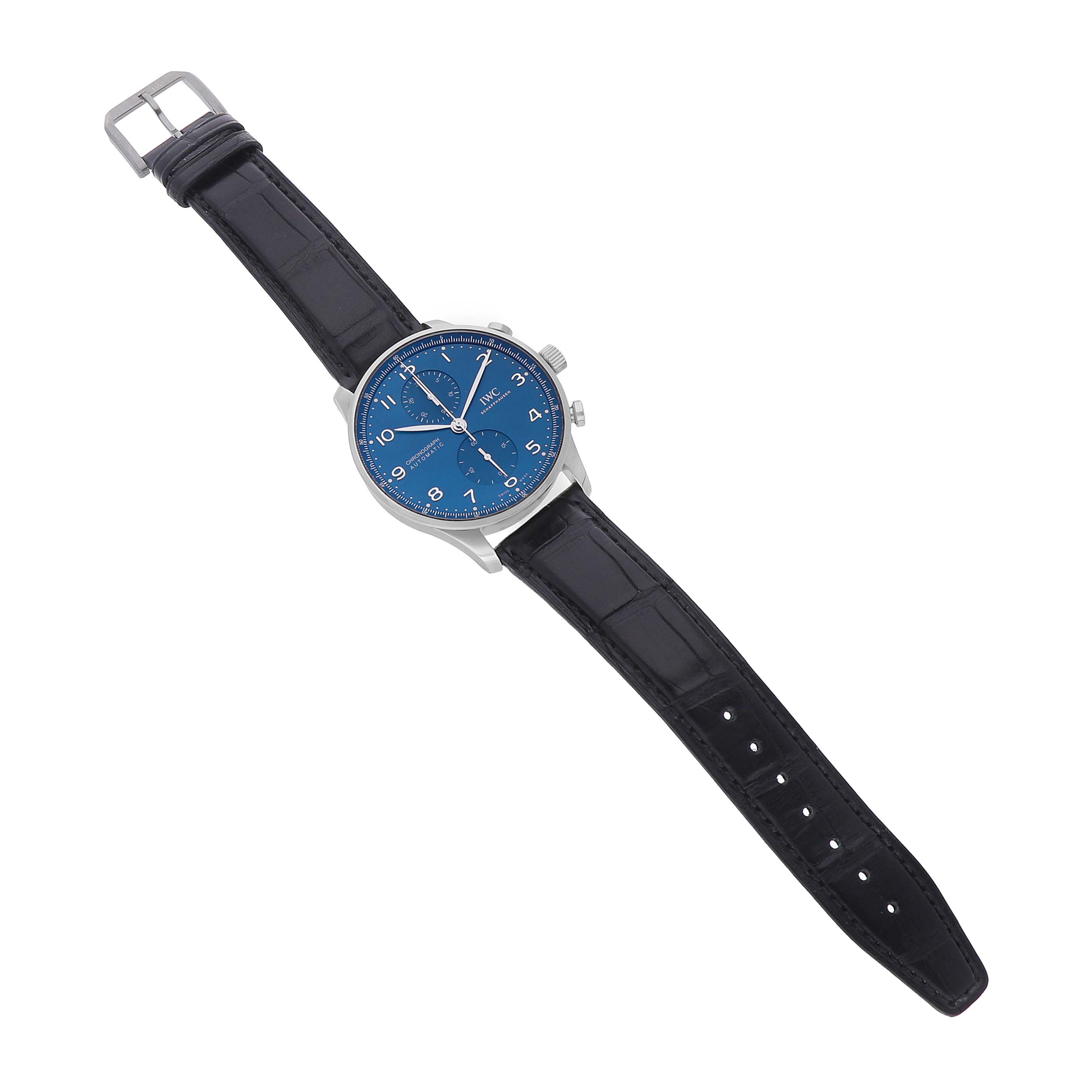 The IWC Portuguese IW371606 Men's Stainless Steel Blue Dial watch is shown from a top-down angle, featuring the blue dial and black leather strap.