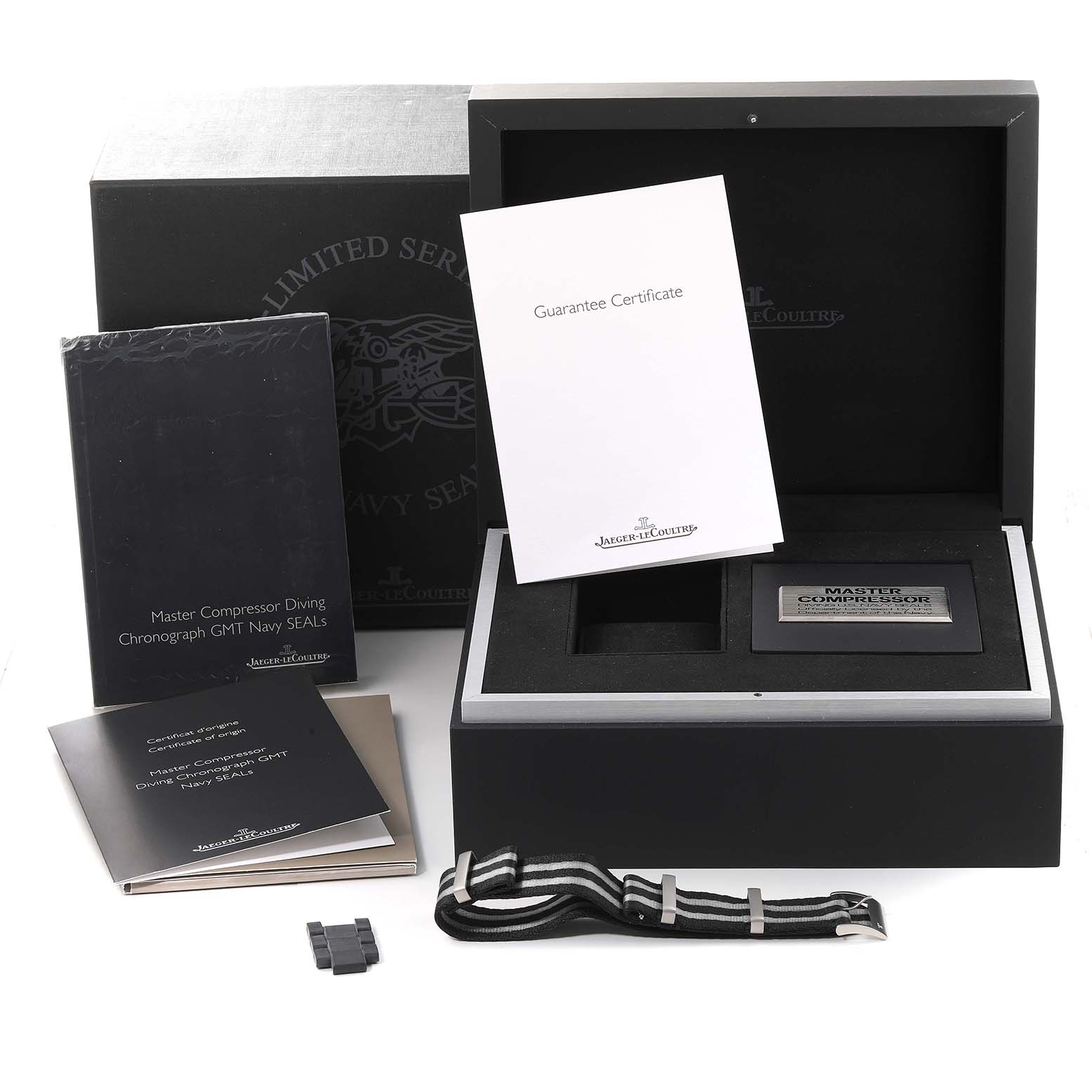 The image shows the packaging, manuals, guarantee certificate, and accessories for the Jaeger LeCoultre Master Q1782470 Men's Rose Gold Black Dial Q1782470 Men's Rose Gold Black Dial model watch.