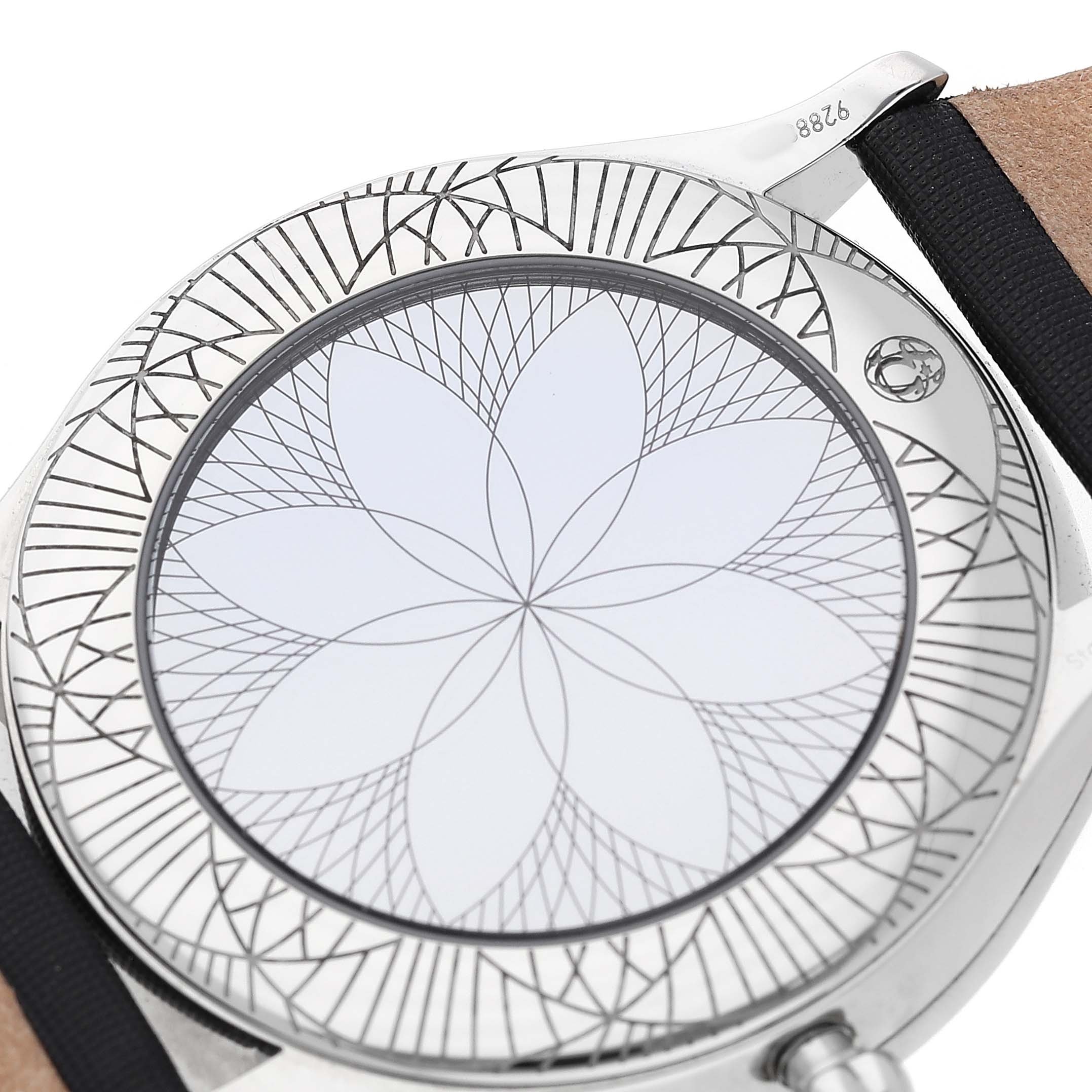 The image shows the back of the Omega 428.17.36.60.05.001 Women's Stainless Steel Mother of Pearl Dial De Ville Tresor Steel Diamond MOP Ladies Watch, featuring an intricate engraved design.