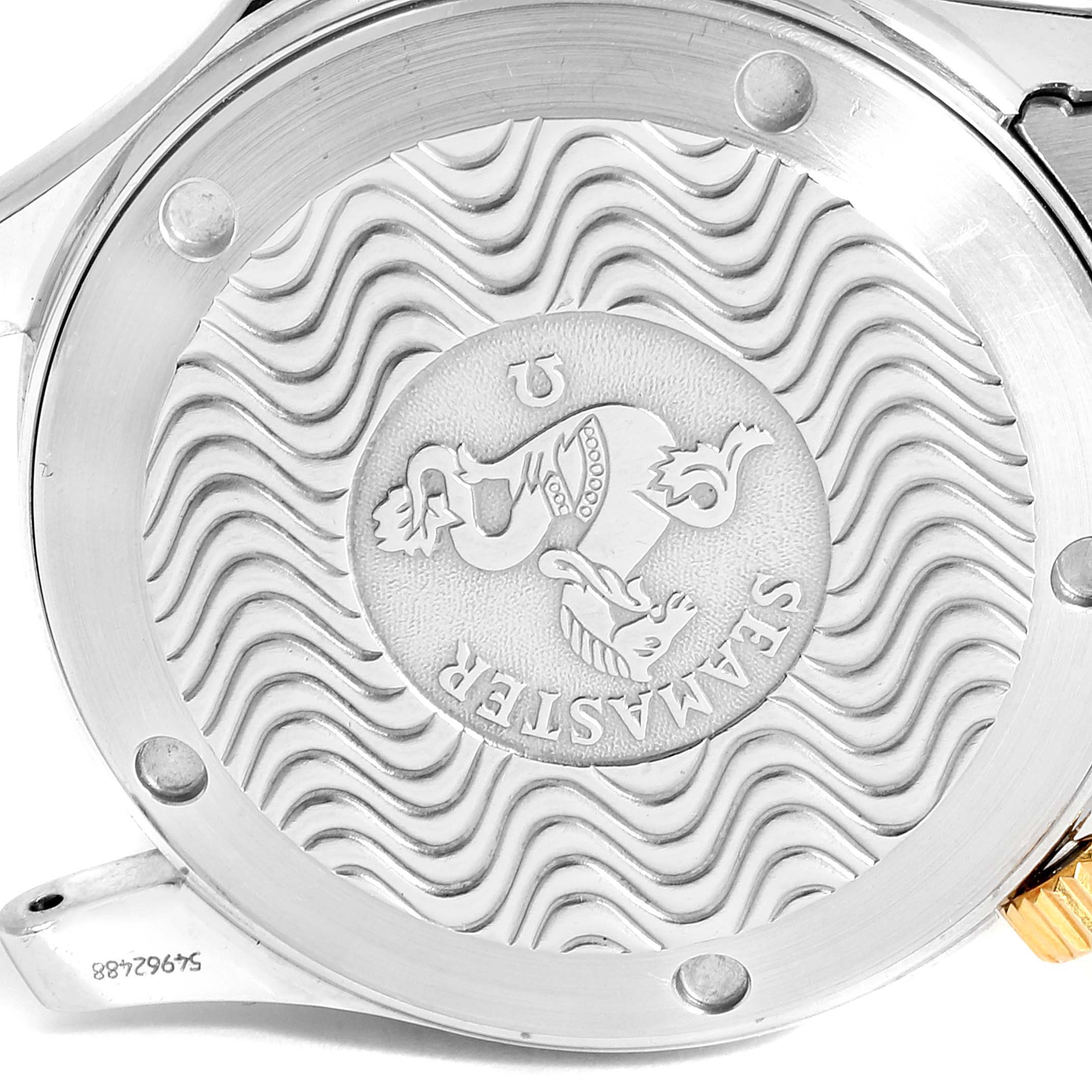 This image shows the back side of the Omega Seamaster 2342.80.00 Men's Steel and Gold (two tone) Blue Dial 2342.80.00 Men's Steel and Gold (two tone) Blue Dial watch, highlighting the case back with its distinctive wave pattern and engraved logo.
