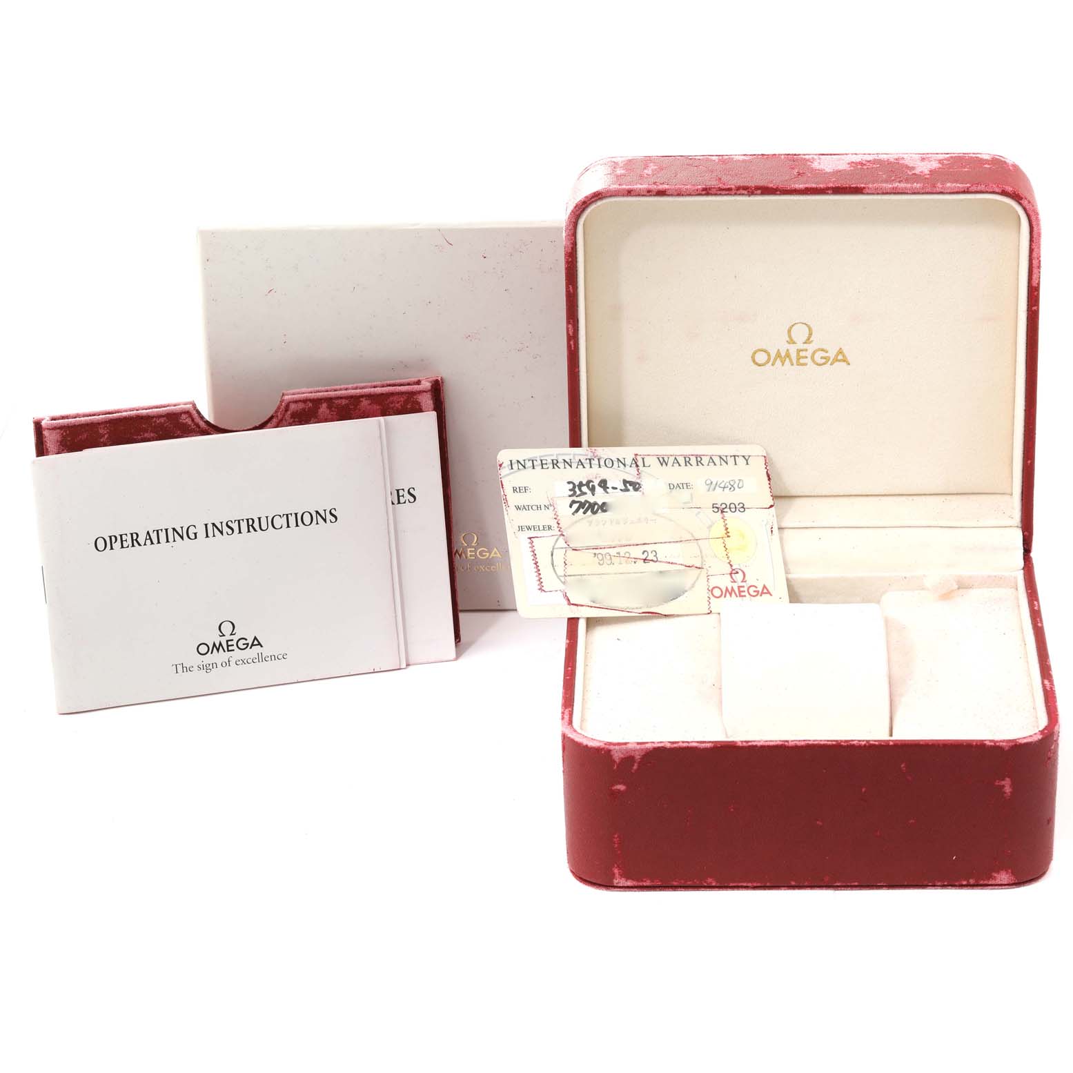 The image shows the Omega Speedmaster 3594.50.00 Men
s Stainless Steel Black Dial 3594.50.00 Men
s Stainless Steel Black Dial watch box, operating instructions, and an international warranty card.