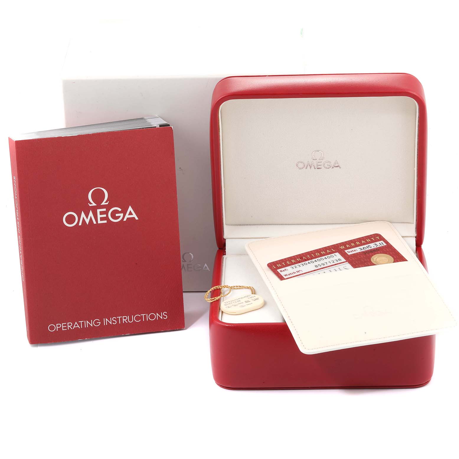 The image shows the packaging, warranty card, and operating instructions for an Omega Speedmaster 323.30.40.40.04.001 Men's Stainless Steel White Dial 323.30.40.40.04.001 Men's Stainless Steel White Dial watch.
