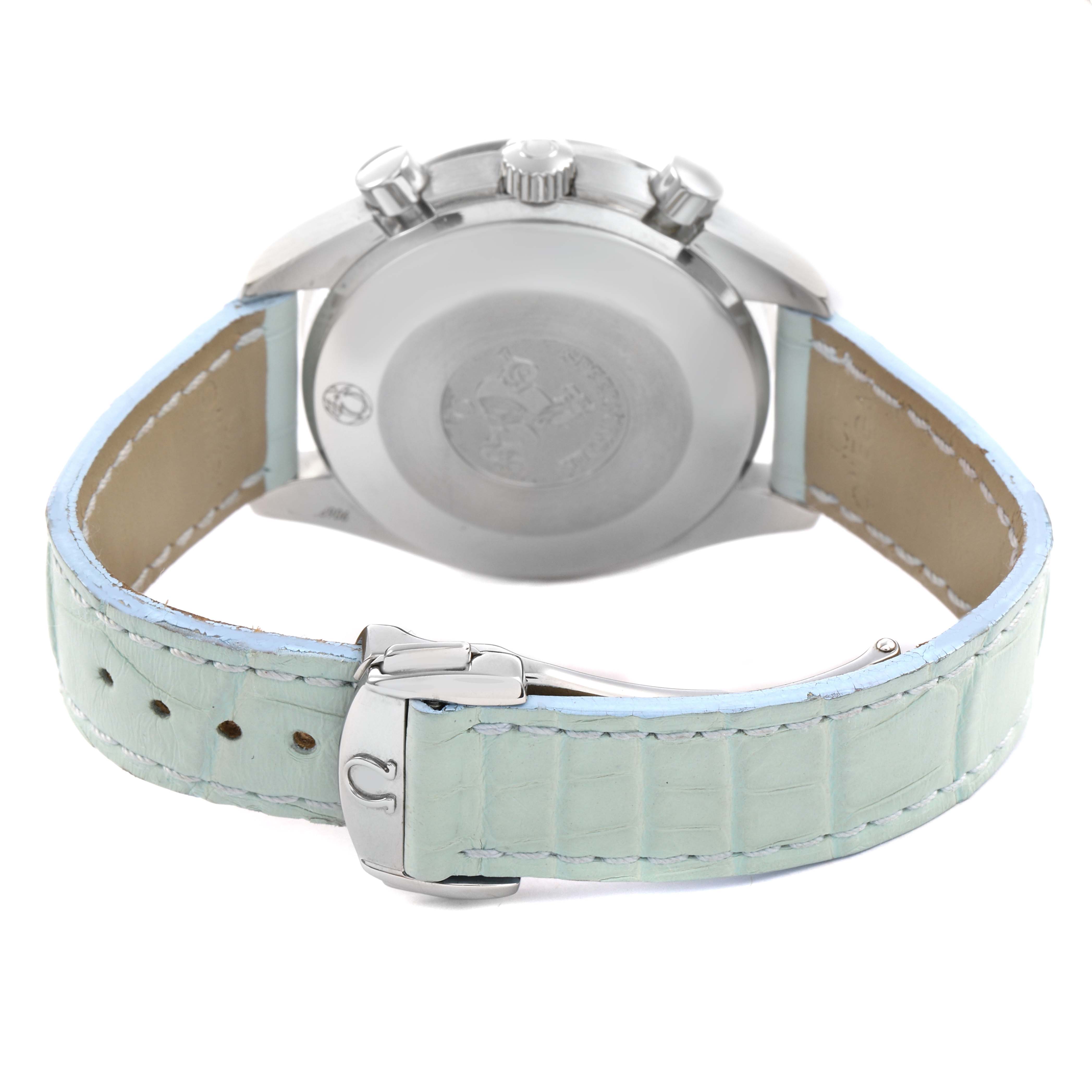 The image shows the back of the Omega Speedmaster 3834.71.33 Men's Stainless Steel Mother of Pearl Dial watch, highlighting its case back, crown, and light blue leather strap.