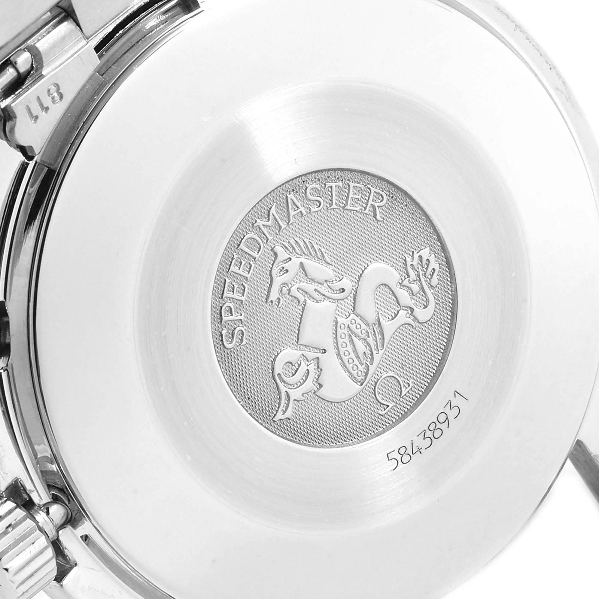 The image shows the engraved case back of an Omega Speedmaster 3510.82.00 Men
s Stainless Steel Blue Dial 3510.82.00 Men
s Stainless Steel Blue Dial watch from an angled view.