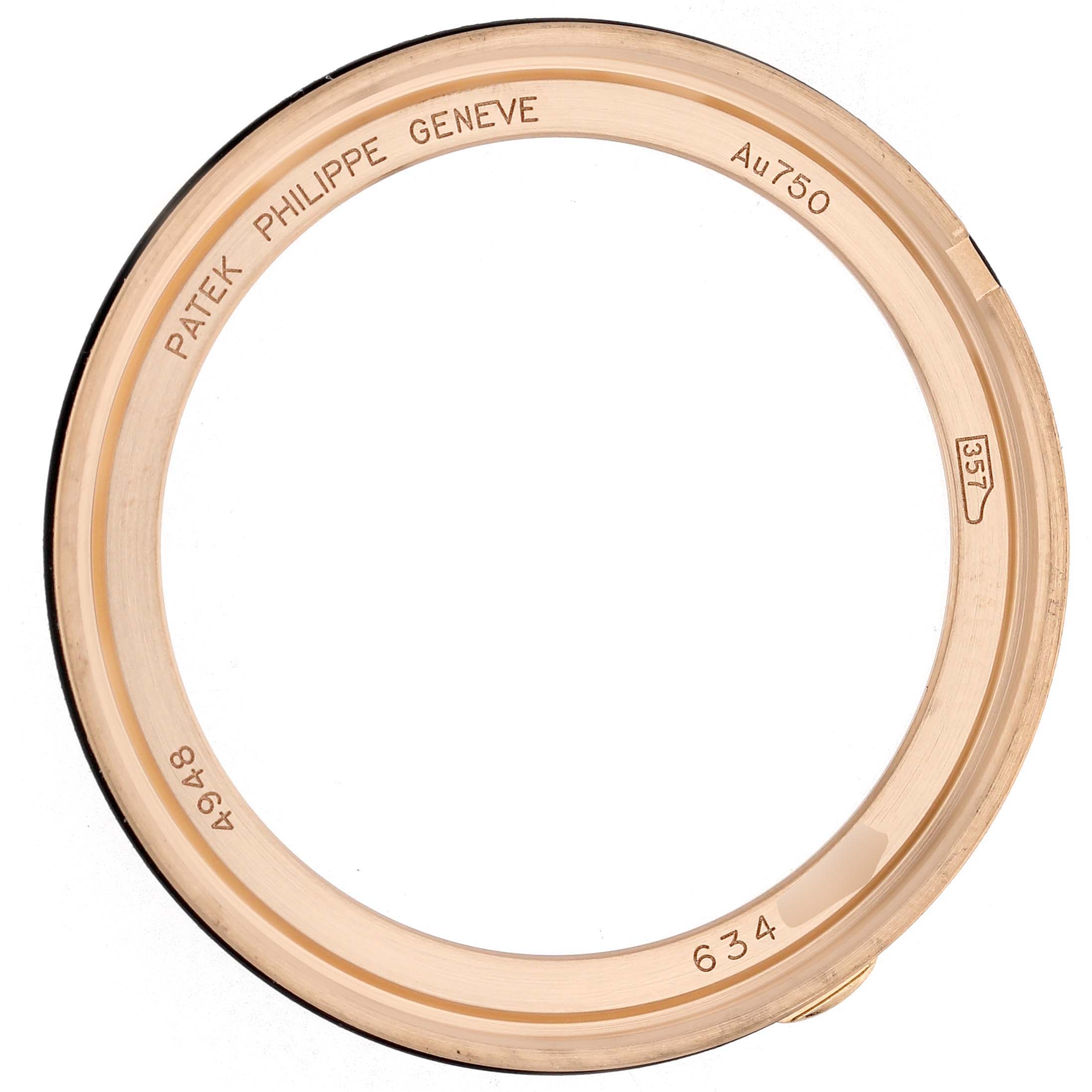 The image shows the bezel of a Patek Philippe Complications 4948R-001 Women's Rose Gold Mother of Pearl Dial watch from a top-down angle, highlighting engraving details.