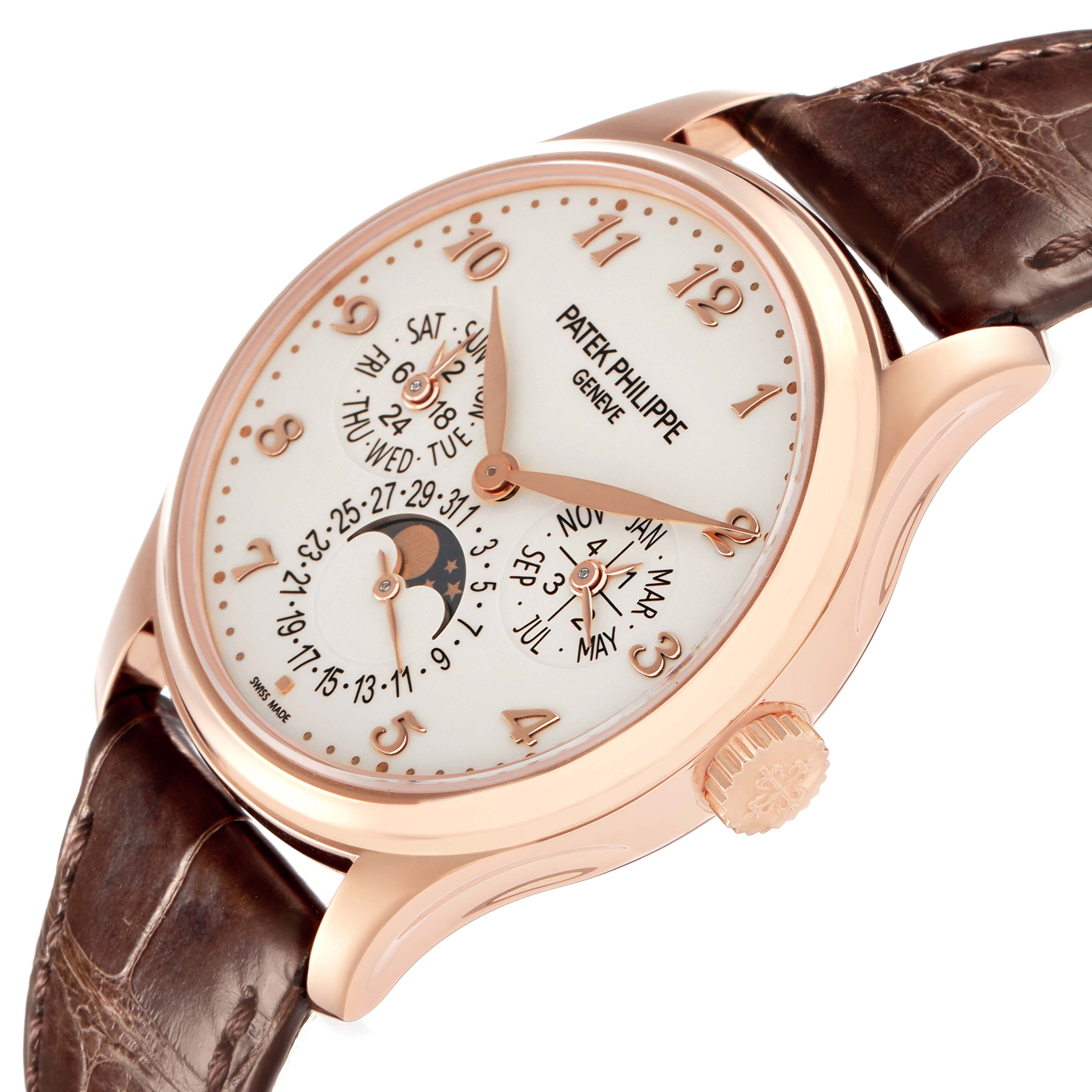 The image shows a Patek Philippe Complications 5327R Men
s Rose Gold White Dial 5327R Men
s Rose Gold White Dial watch at an angled view highlighting the dial, rose gold case, crown, and leather strap.
