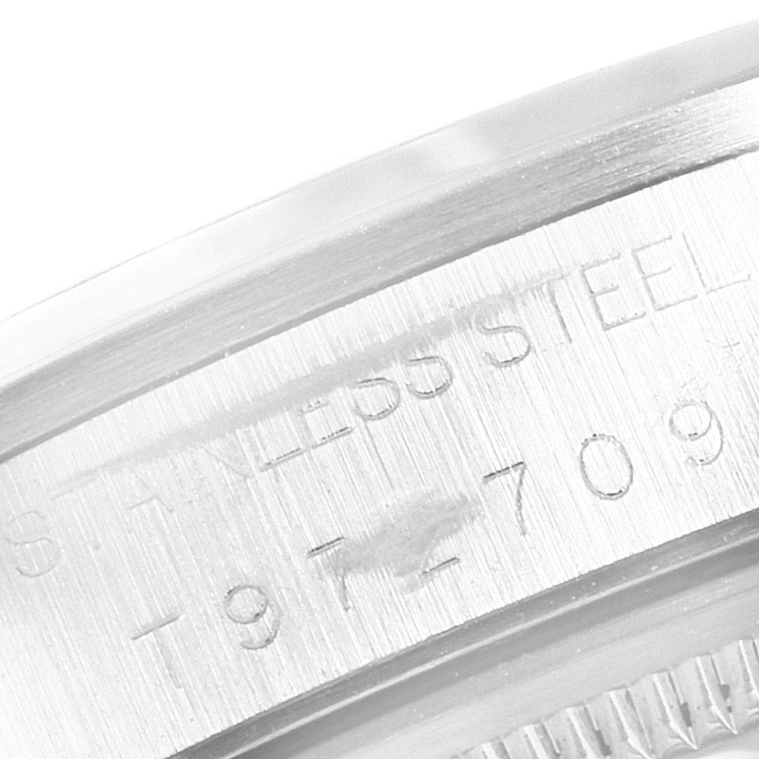 This close-up image of a Rolex Air-King 14000 Men's Stainless Steel Black Dial 14000 Men's Stainless Steel Black Dial watch shows the engraved text on the stainless steel case.