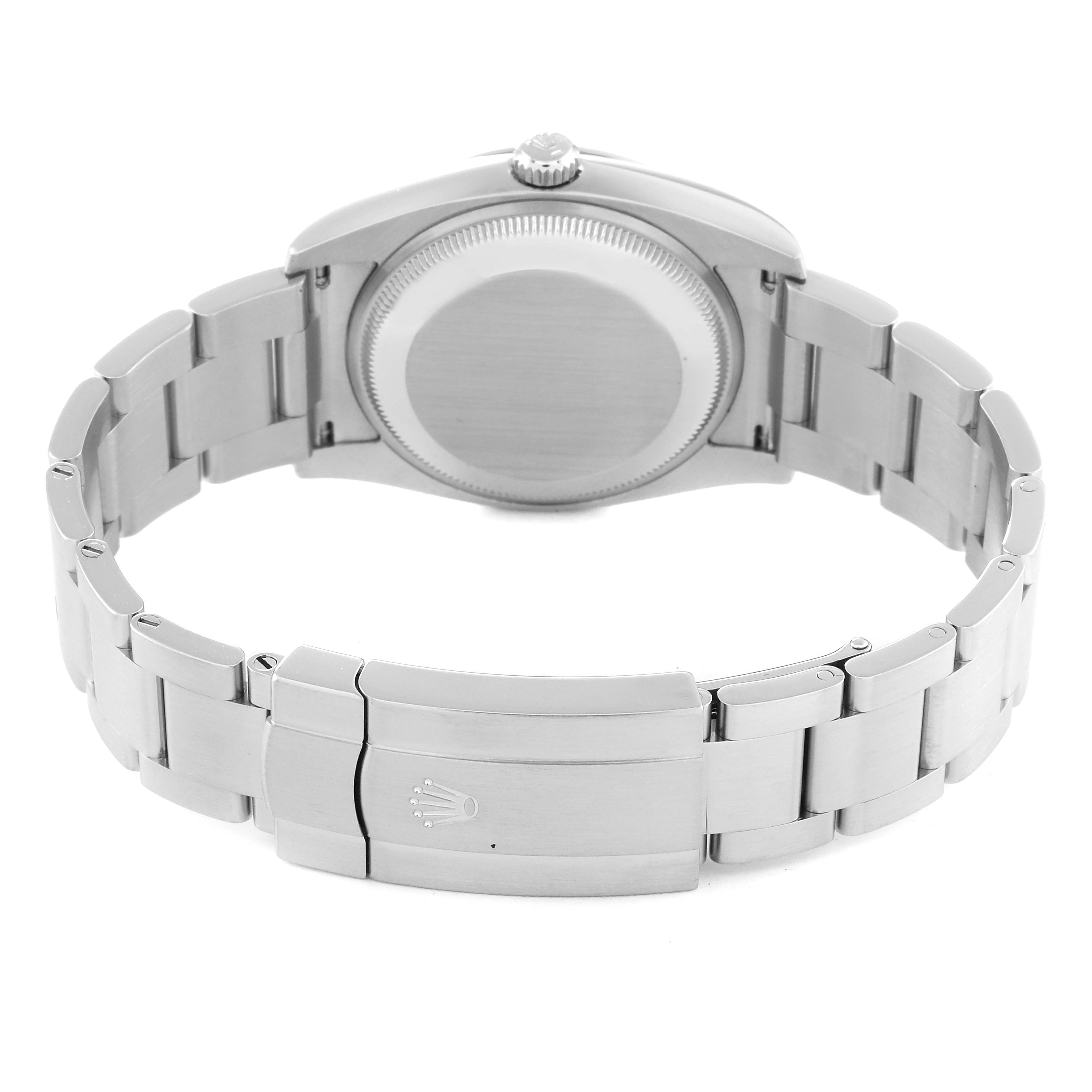 The image shows the back case and bracelet clasp of the Rolex Oyster Perpetual 114200 Men's Stainless Steel Blue Dial 114200 Men's Stainless Steel Blue Dial watch.