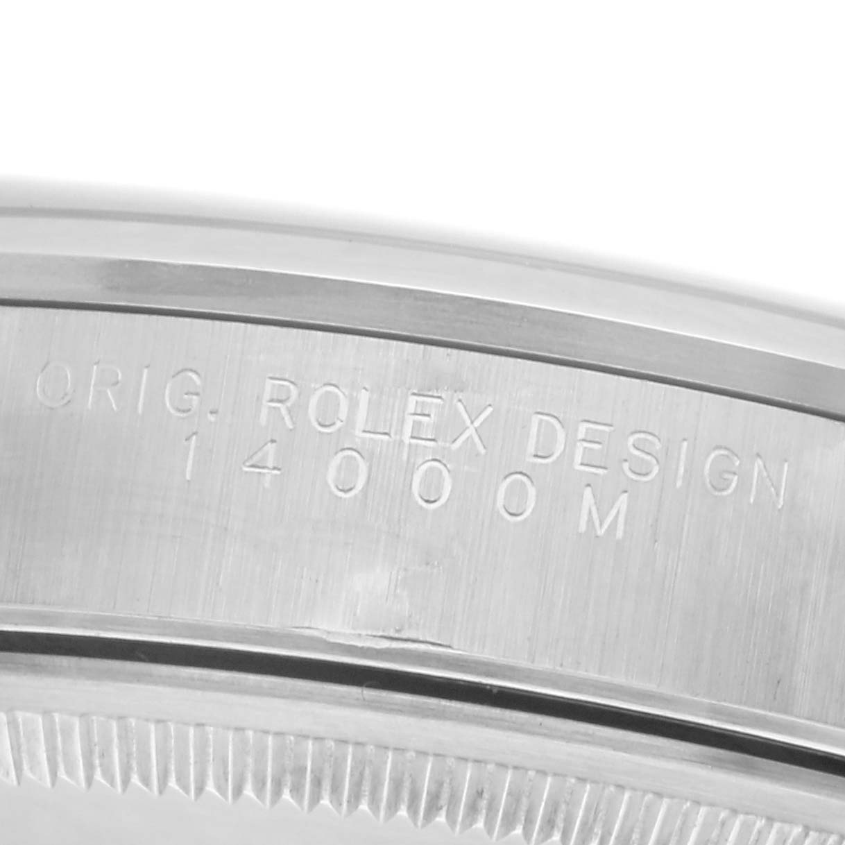 The image shows a close-up of the Rolex Air-King 14000 Men's Stainless Steel Pink Dial 14000 Men's Stainless Steel Pink Dial's case side, highlighting engraved text with the model number.