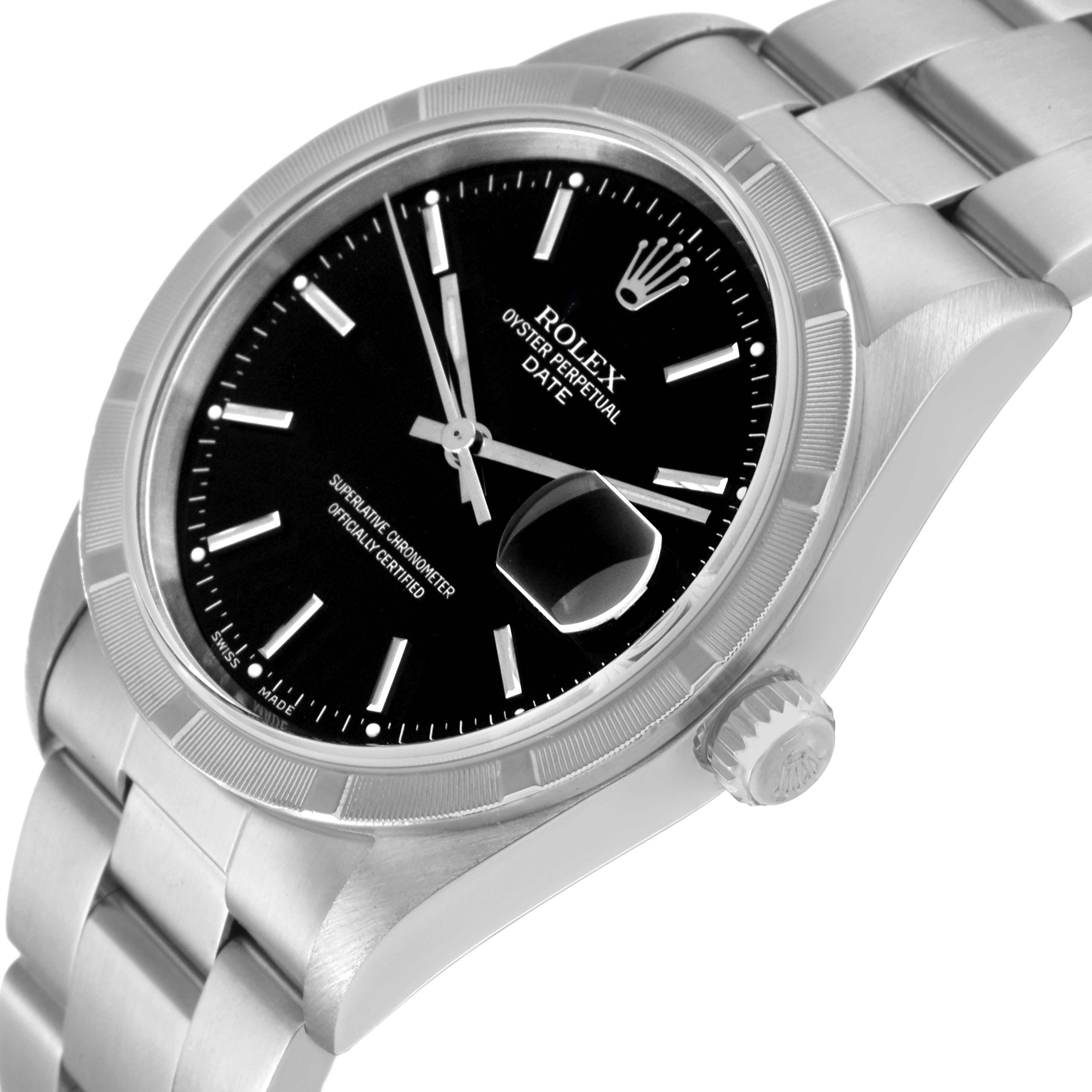 This image shows a close-up, angled view of a Rolex Oyster Perpetual Date watch, highlighting the dial, bezel, crown, and part of the bracelet.